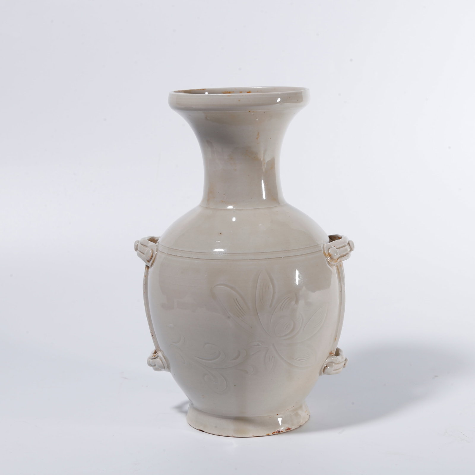 A DING WARE INCISED STRAP?MOUNTED VASE: Ding ware incised strap?mounted vase