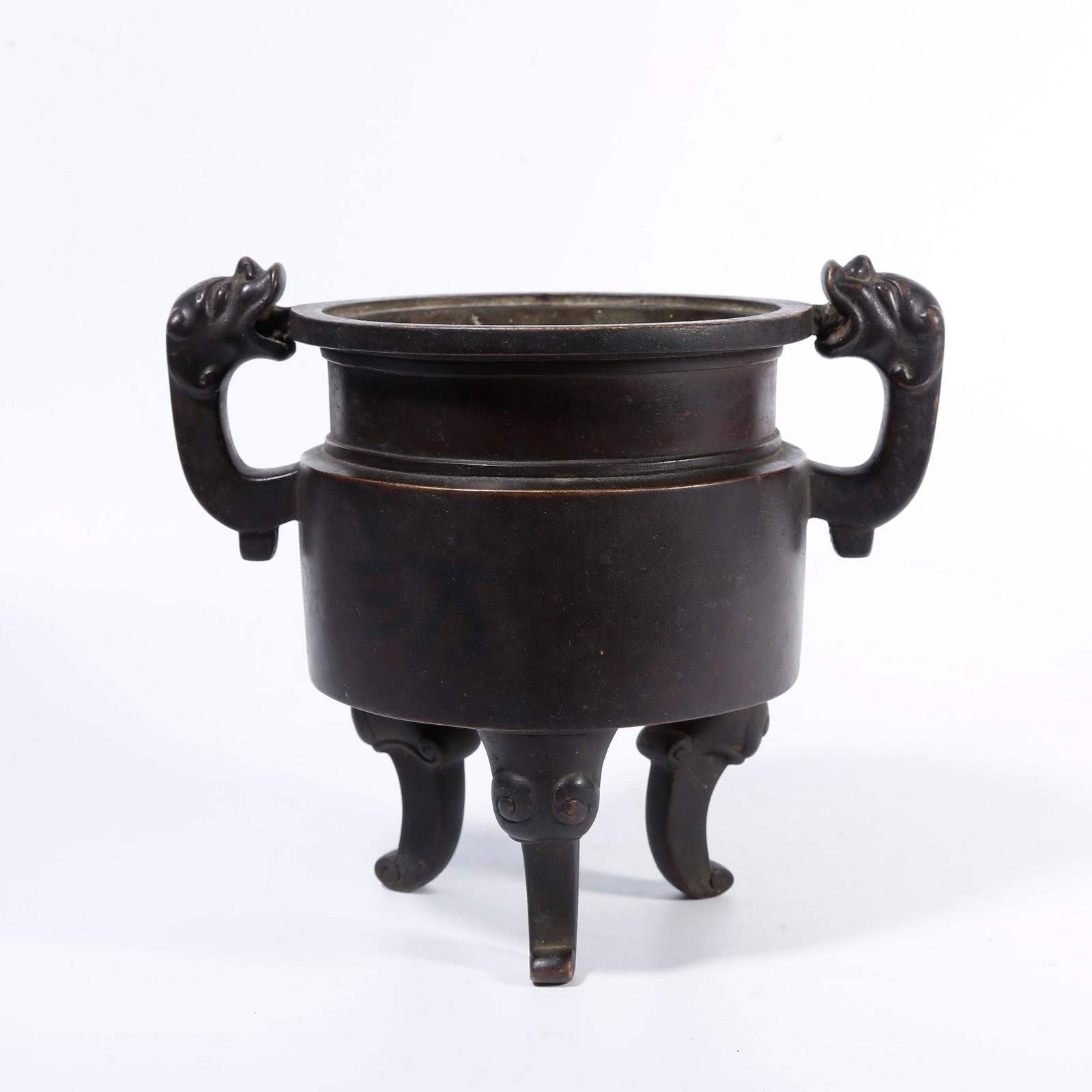A BRONZE THREE?LEGGED DOUBLE?EAR INCENSE CENSER: Bronze three?legged double?ear incense censer