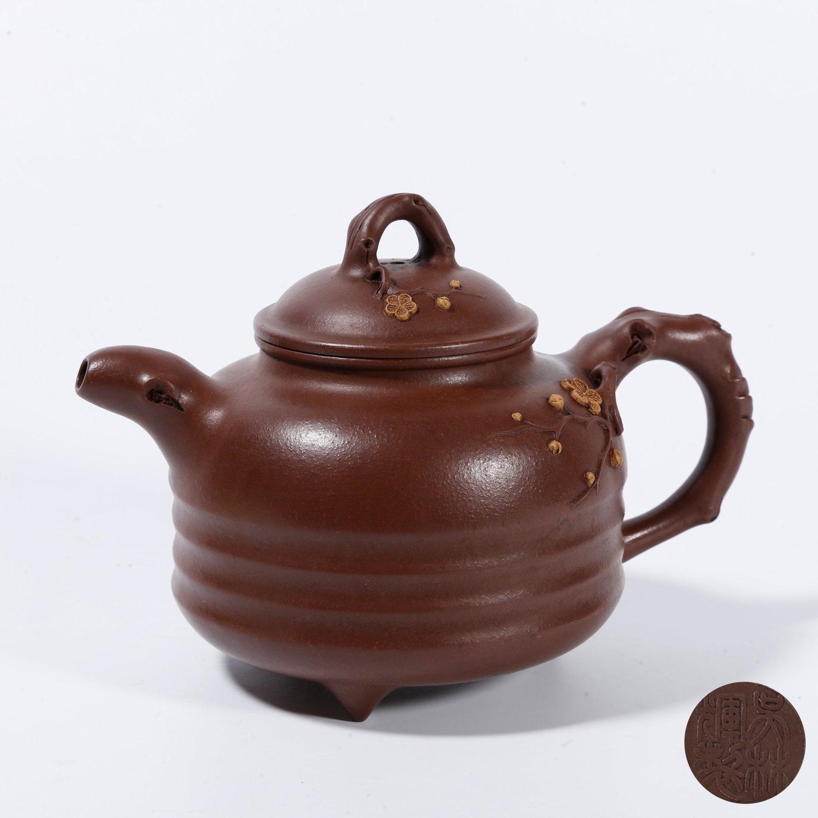 A ZISHA EWER CARVED WITH PLUM?BLOSSOM PATTERN: Zisha ewer carved with plum?blossom pattern
