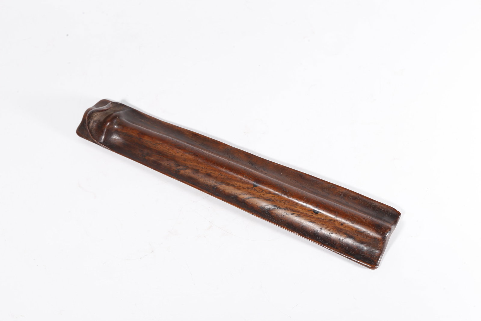 A WRIST REST OF HUANGHUALI WOOD: Wrist rest of huanghuali wood