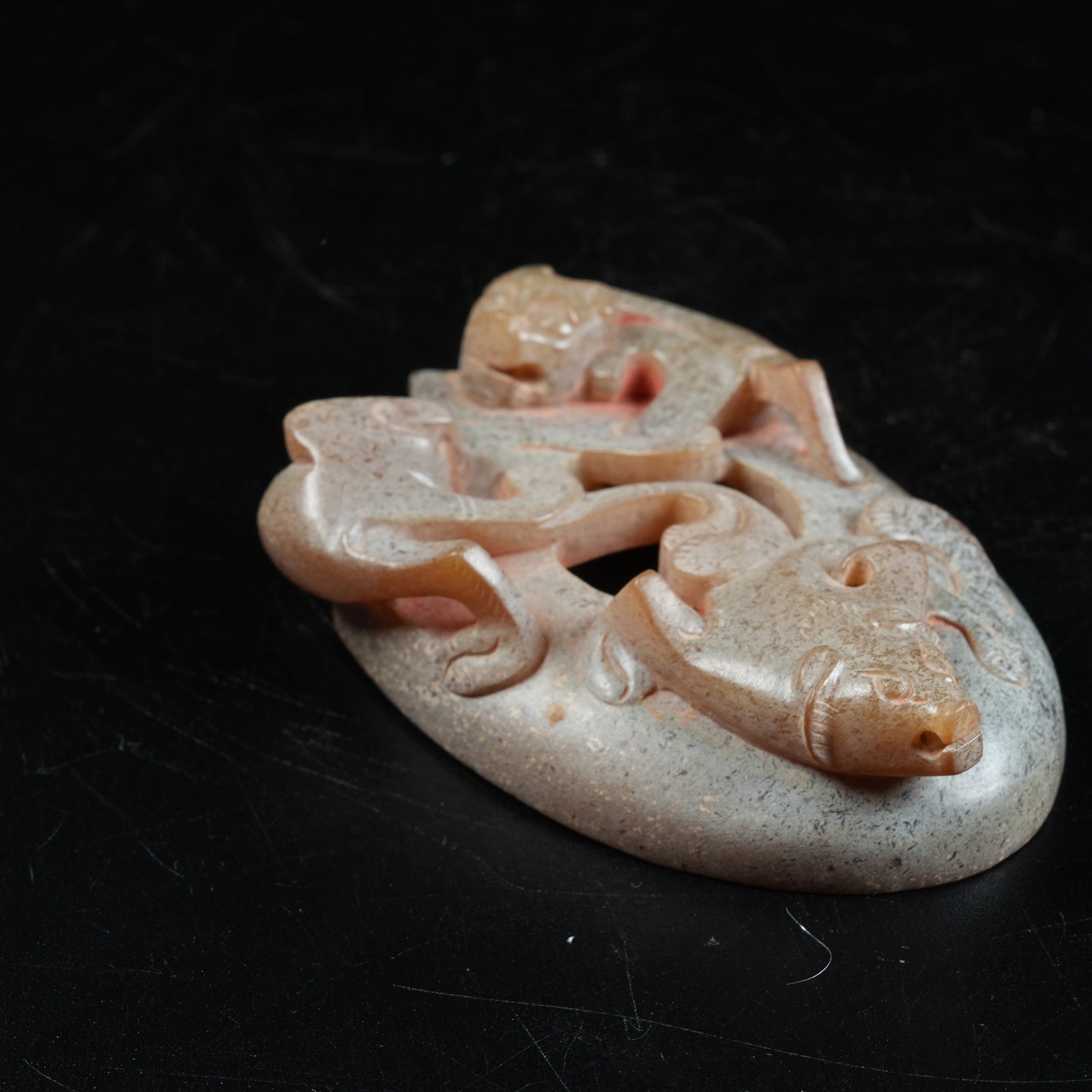 A ANCIENT JADE HEART-SHAPED PENDANT WITH CHI DRAGON PATTERN: Ancient Jade Heart-shaped Pendant with Chi Dragon Pattern