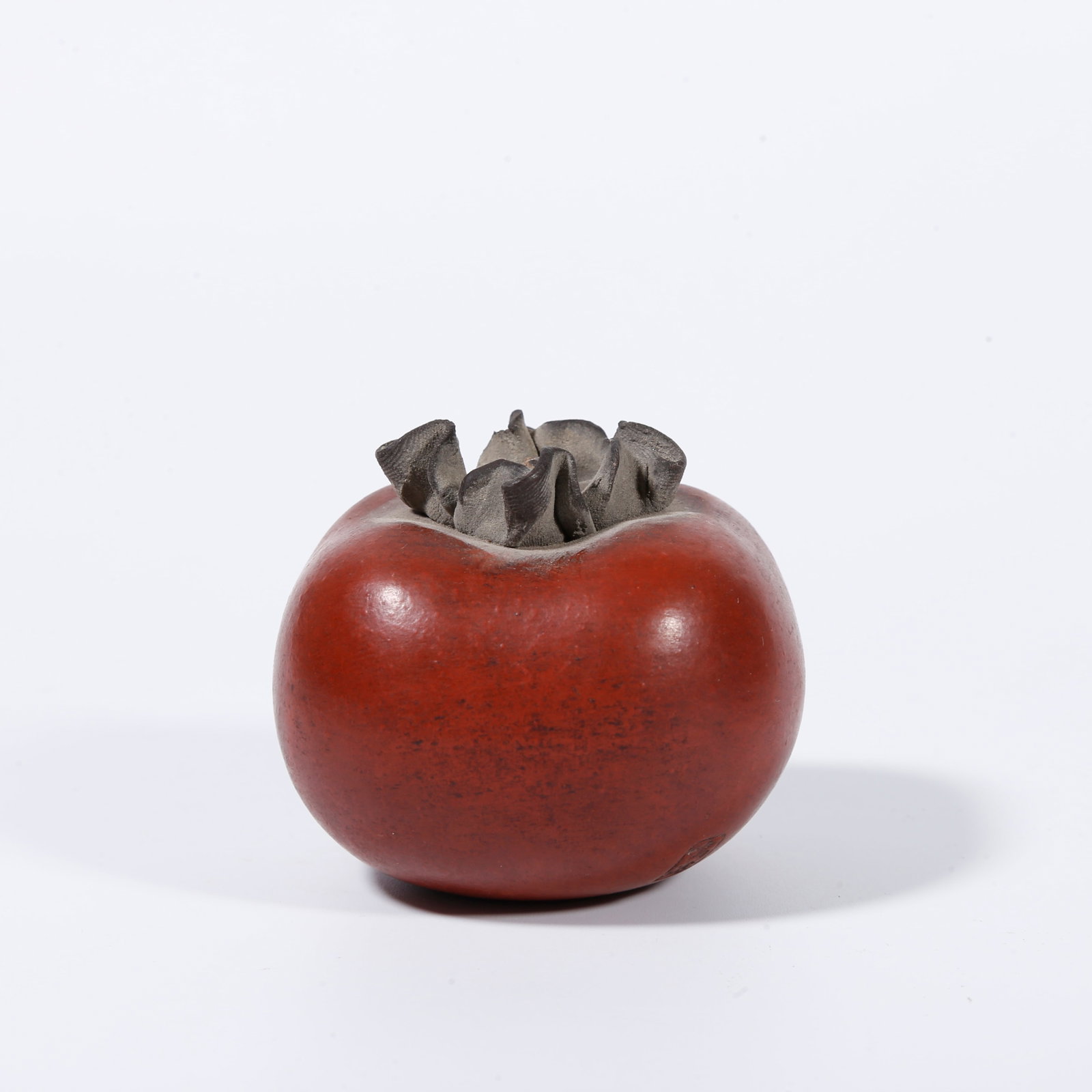 A ZISHA PAPERWEIGHT WITH EVERYTHING?GOES?WELL MOTIF (1 of 8)