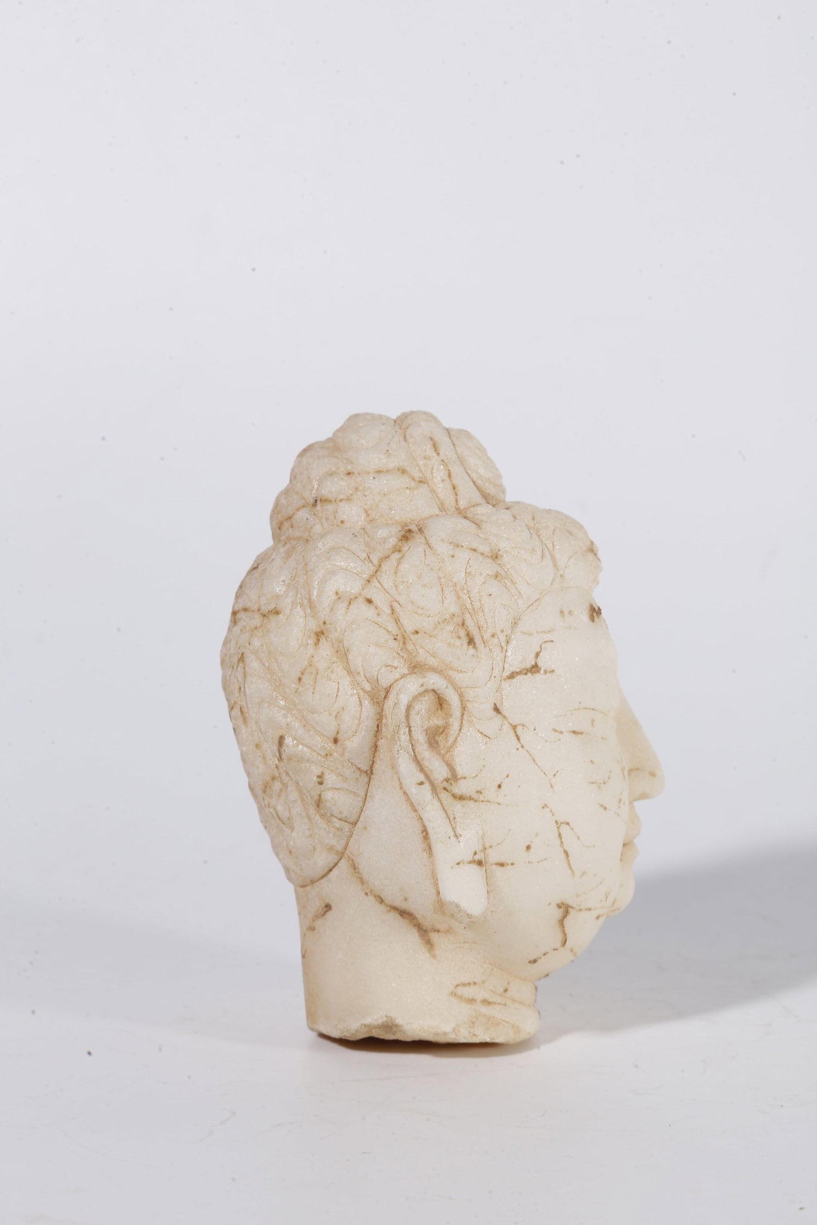 A WHITE MARBLE BUDDHA HEAD (SET) - 5