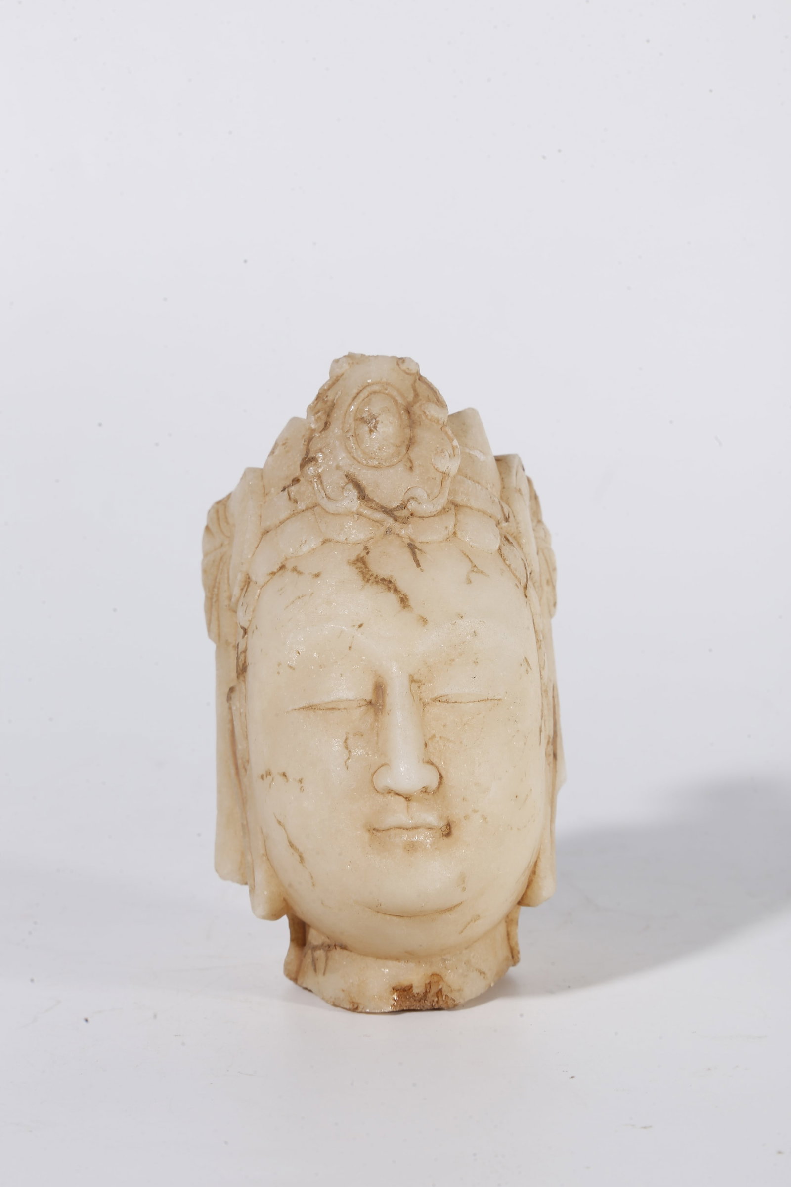 A WHITE MARBLE BUDDHA HEAD (SET) - 6