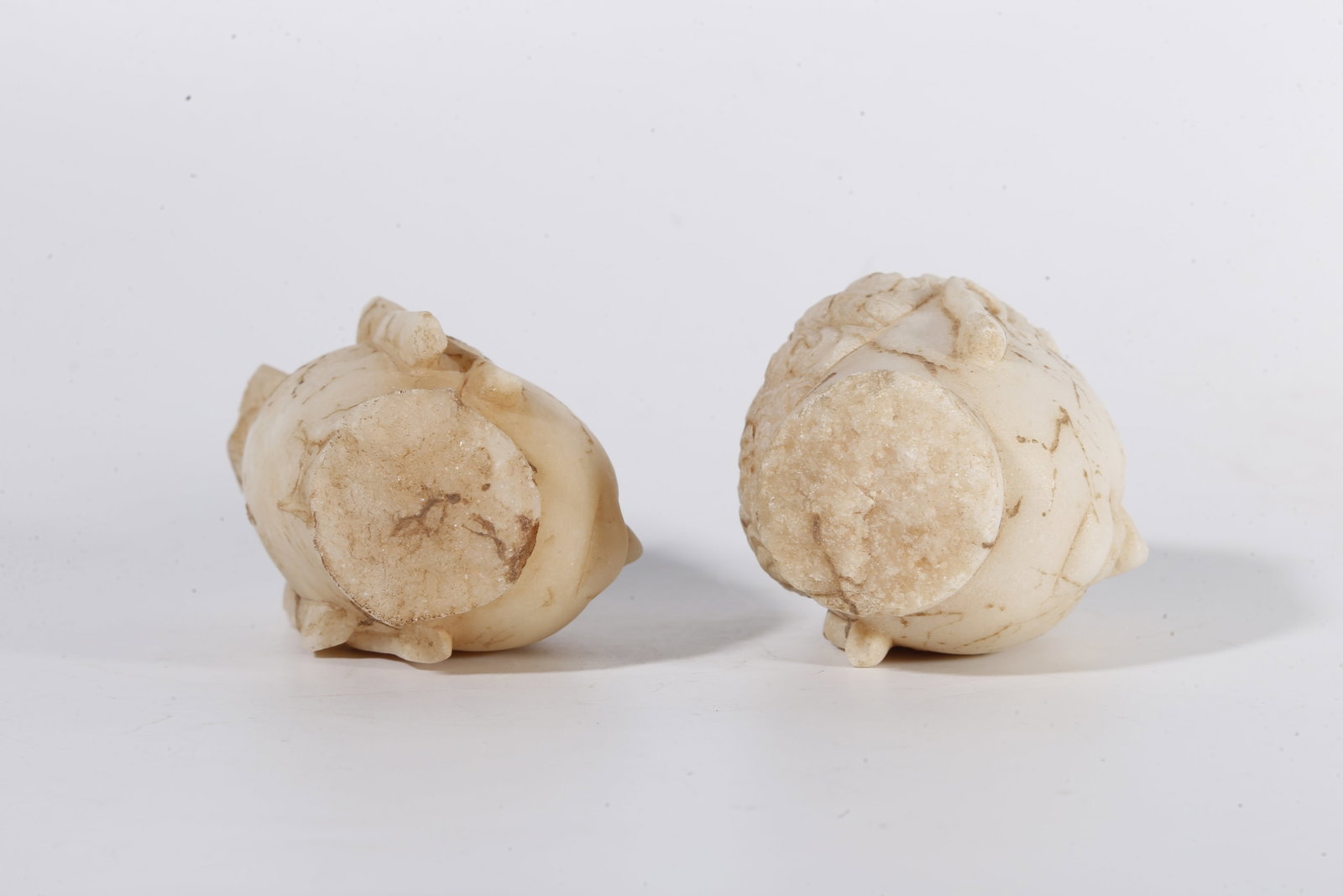 A WHITE MARBLE BUDDHA HEAD (SET) - 9