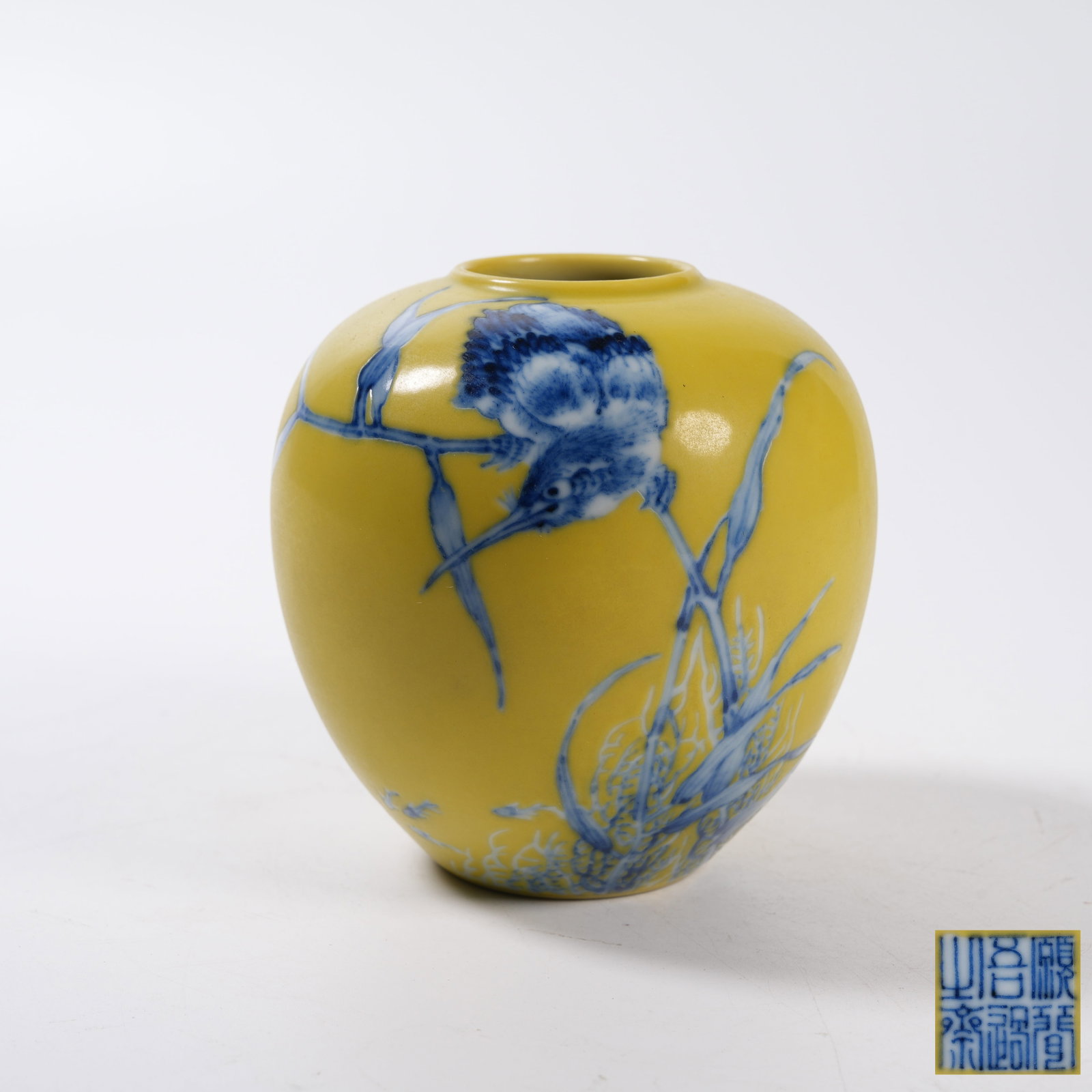 A BLUE AND WHITE JAR WITH MAGPIE ON PLUM BRANCH ON YELLOW GROUND (1 of 9)