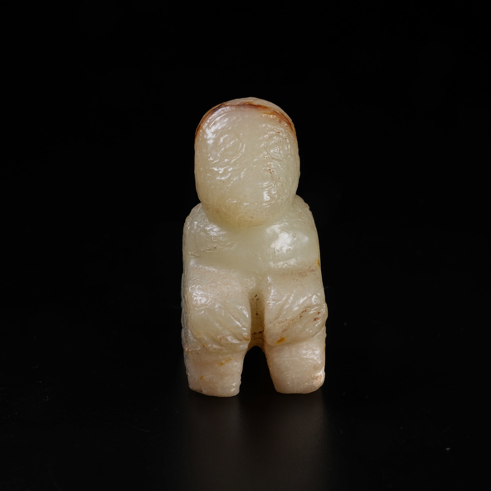 A ARCHAIC JADE KNEELING HUMAN FIGURINE: Archaic Jade Kneeling Human Figurine