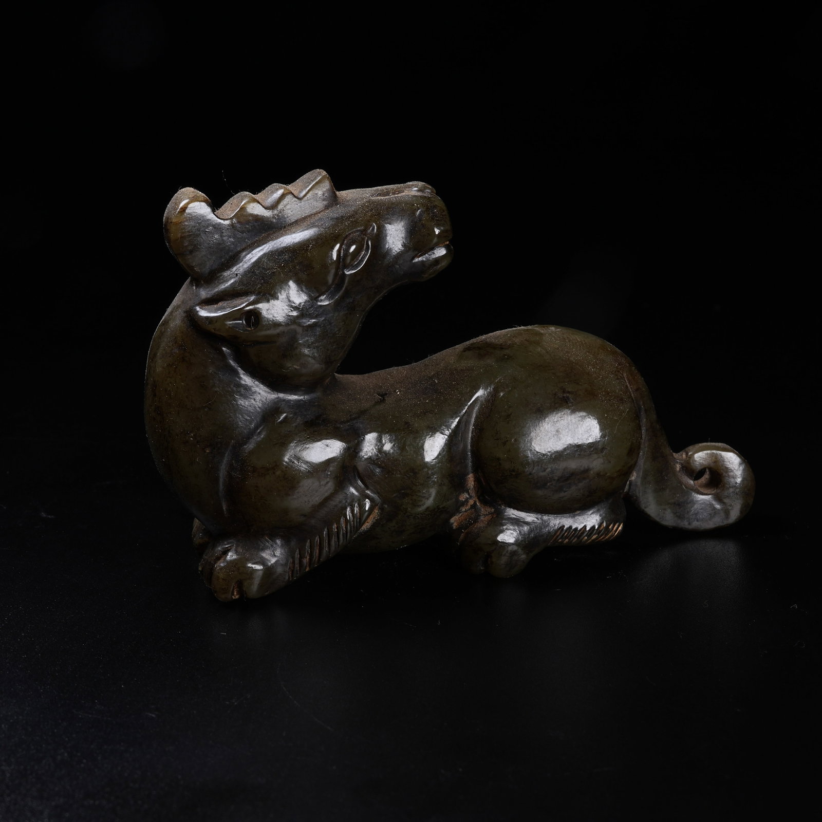 A ARCHAIC JADE RECUMBENT BEAST ORNAMENT: Archaic Jade Recumbent Beast Ornament
