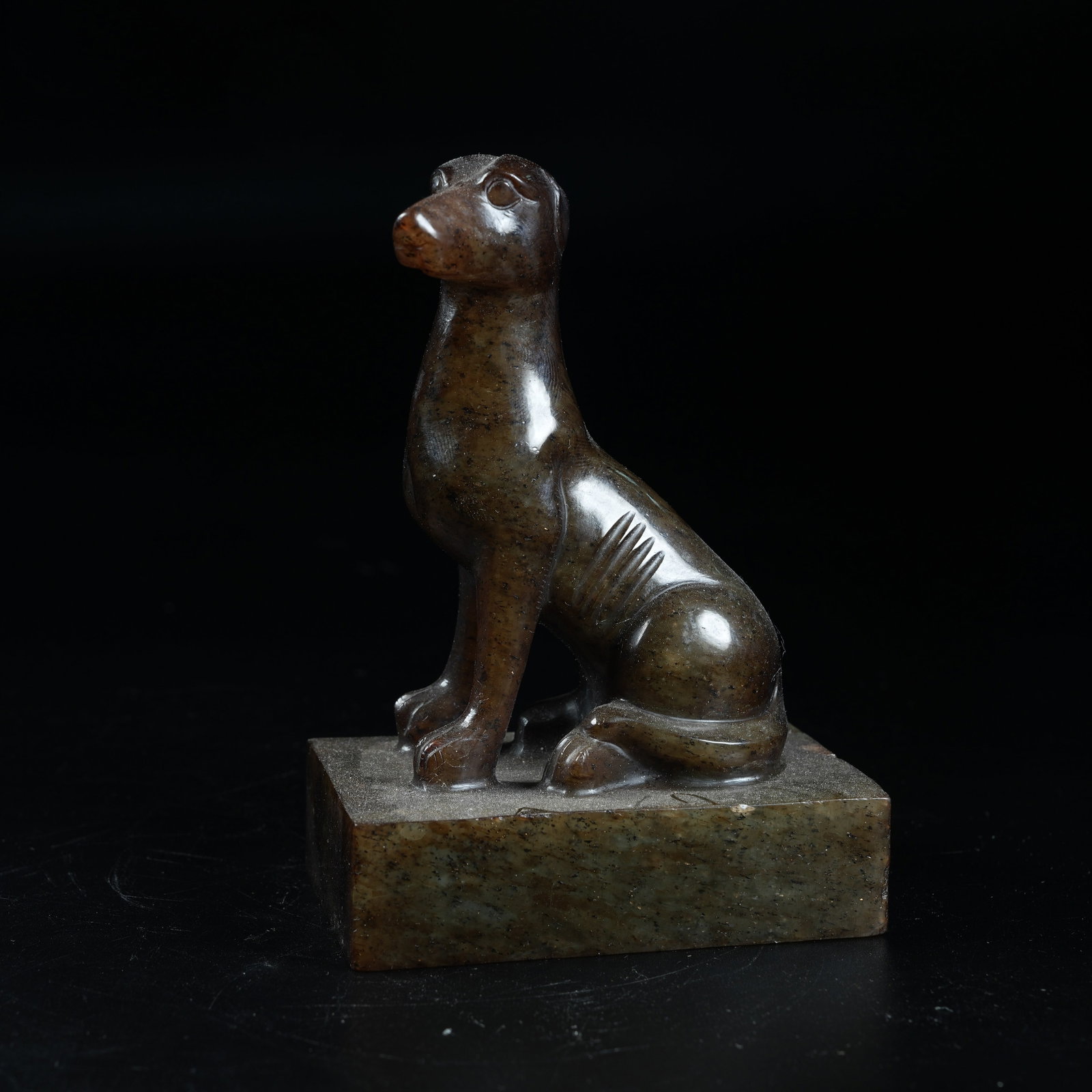 A ANCIENT JADE SEAL WITH DOG KNOB: Ancient Jade Seal with Dog Knob