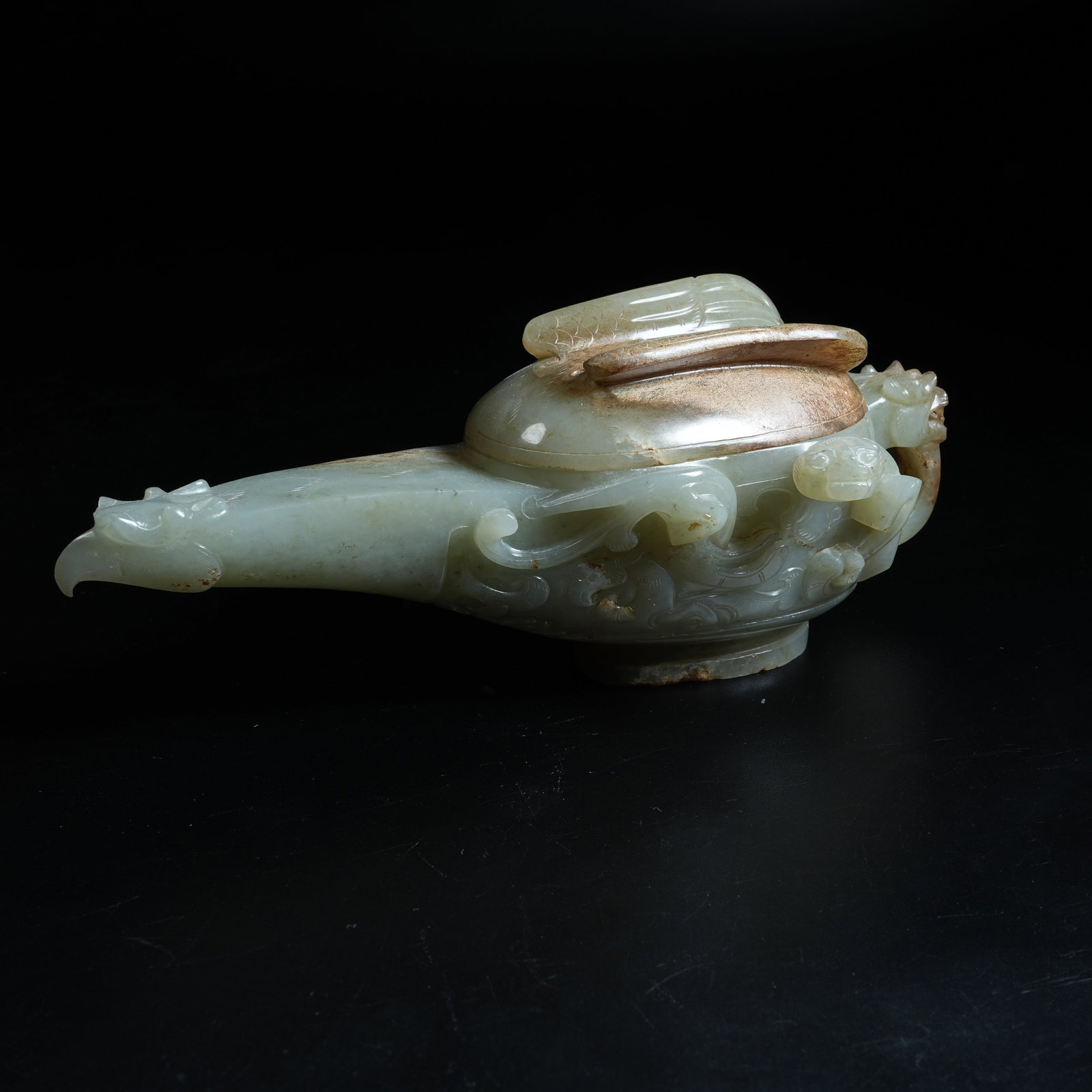 A ANCIENT JADE PHOENIX-SHAPED HANDLED POT: Ancient Jade Phoenix-shaped Handled Pot