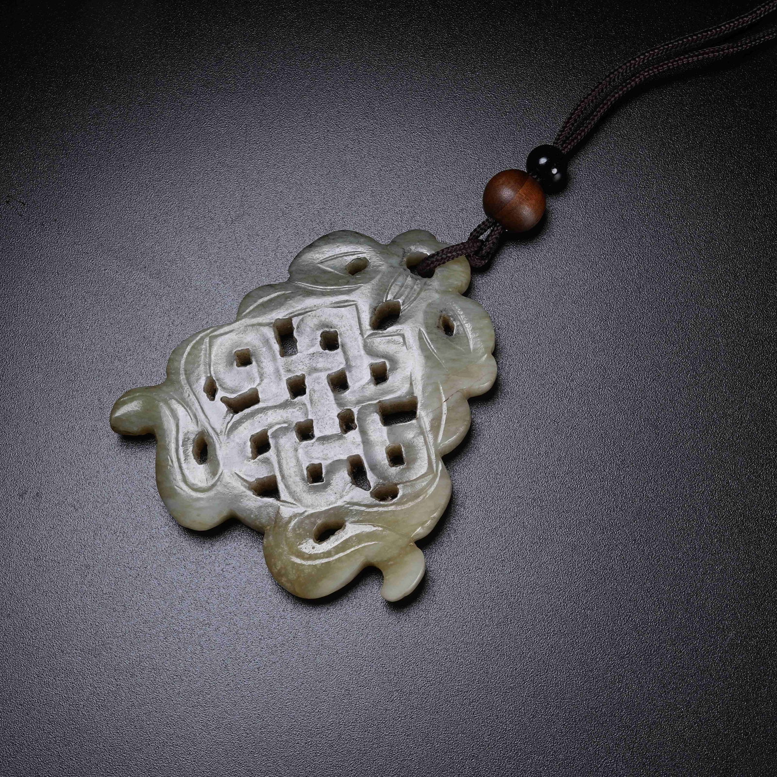 A HETIAN JADE PENDANT: Hetian Jade Pendant