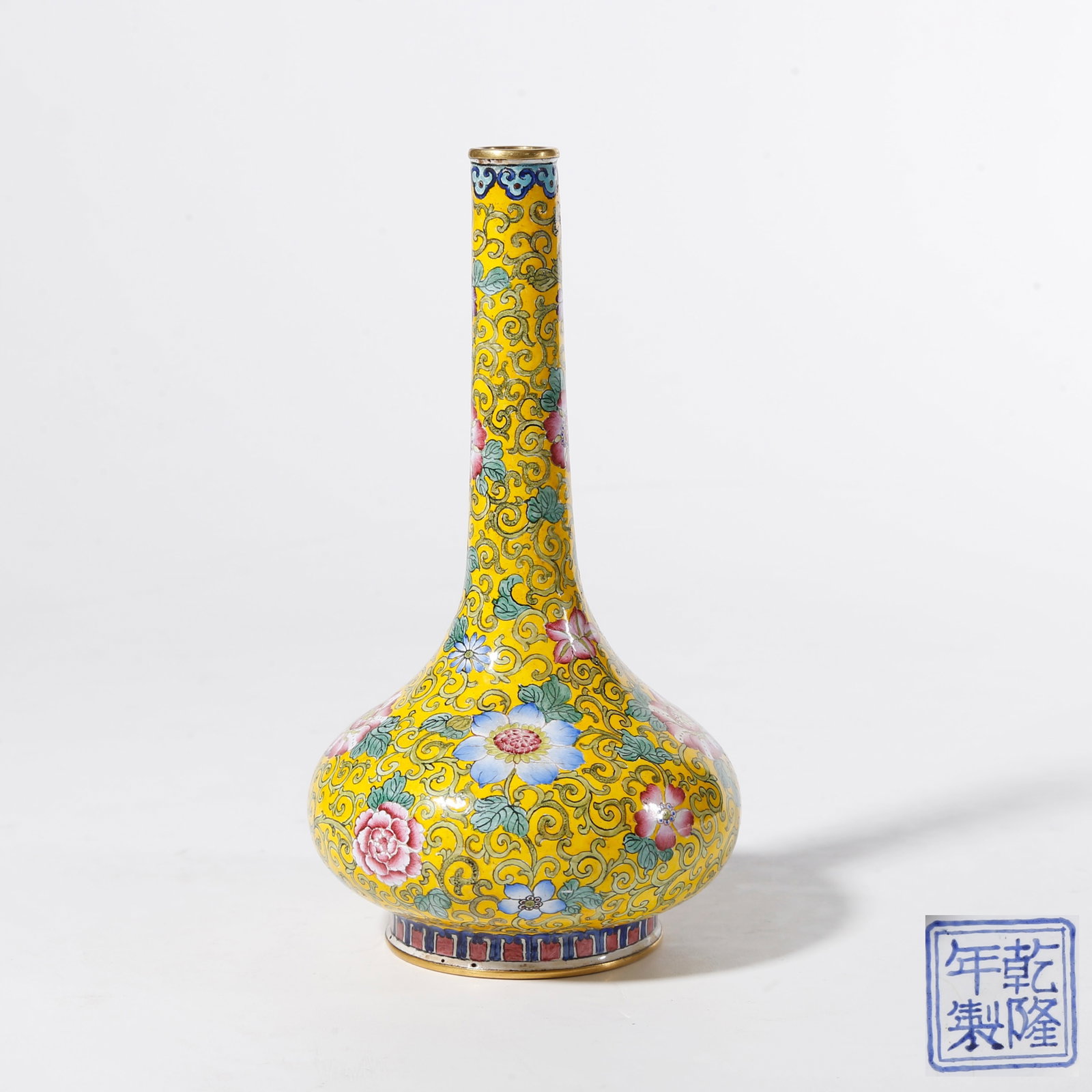 A PAINTED ENAMEL ON BRONZE BODY LONG?NECK VASE WITH INTERLOCKING FLORAL SCROLLS: Painted Enamel on Bronze Body Long?Neck Vase with Interlocking Floral Scrolls
