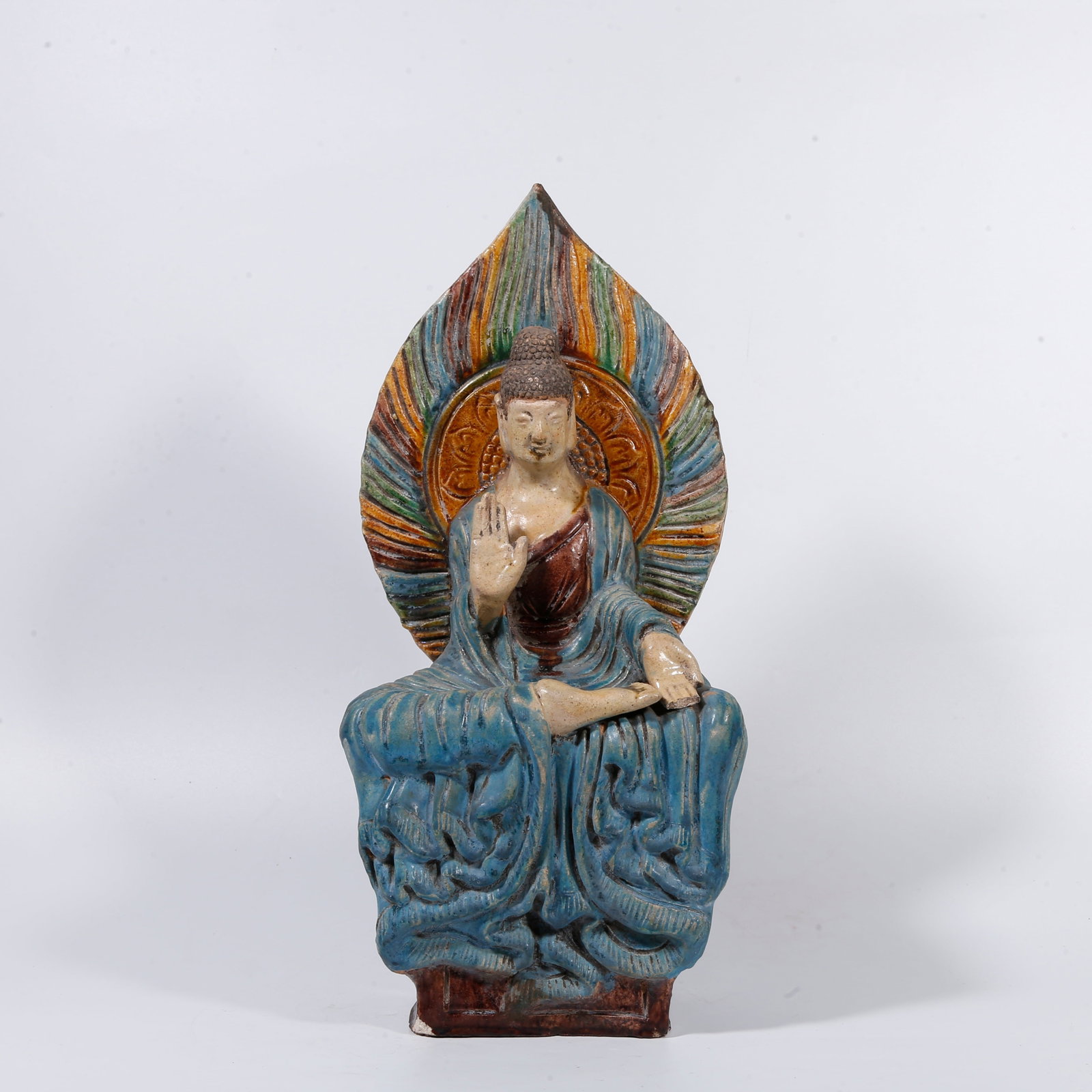 A TRI?COLOR BUDDHA STATUE (FINGERS DAMAGED): Tri?color Buddha statue (fingers damaged)