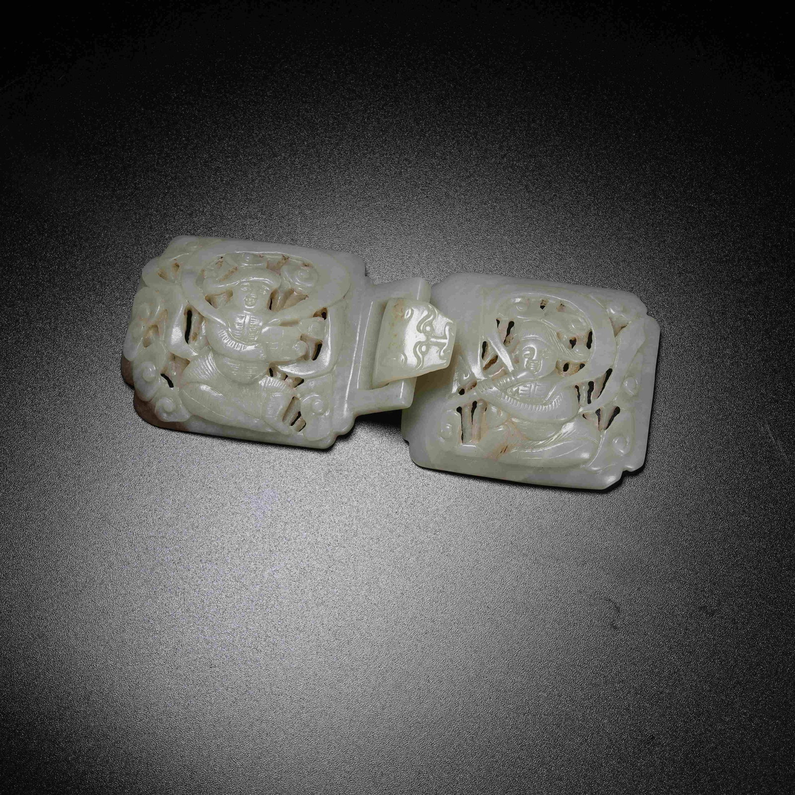 A ARCHAIC JADE BELT ORNAMENT WITH MUSICIAN FIGURINE PATTERN: Archaic Jade Belt Ornament with Musician Figurine Pattern