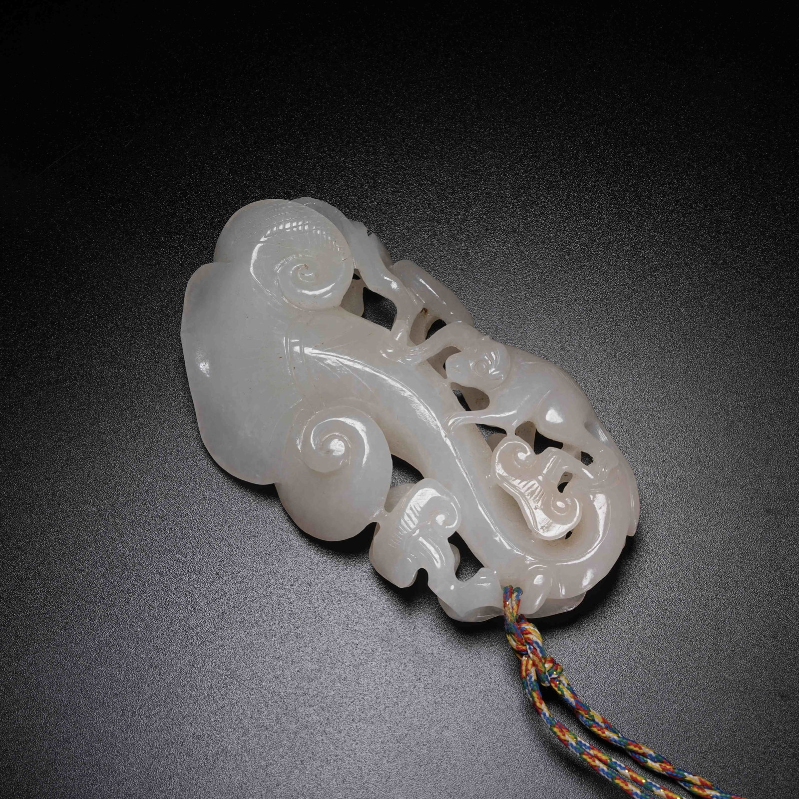 A ARCHAIC JADE GANODERMA RUYI ORNAMENT: Archaic Jade Ganoderma Ruyi Ornament