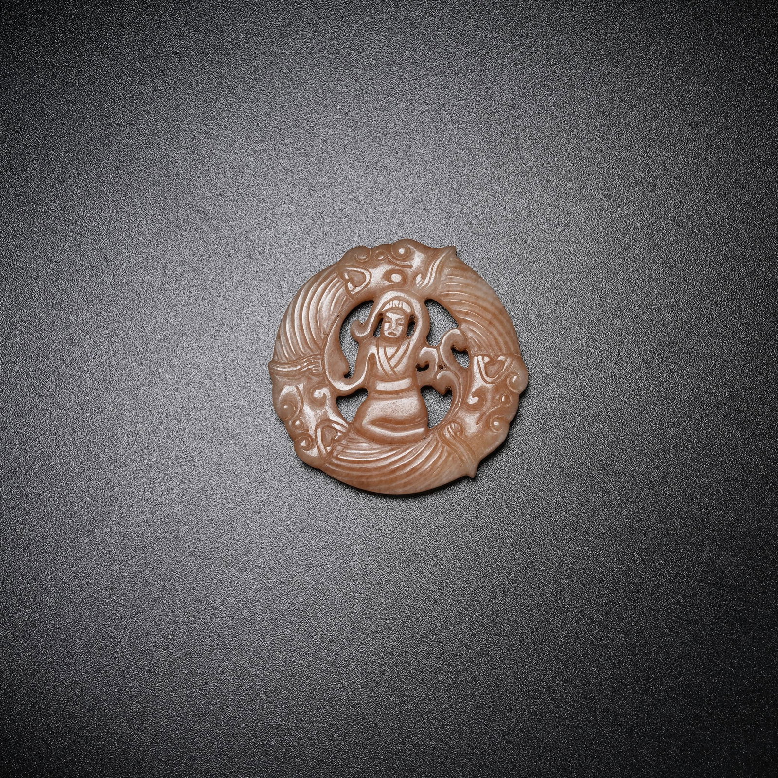A HETIAN JADE PENDANT WITH DANCER PATTERN: Hetian Jade Pendant with Dancer Pattern