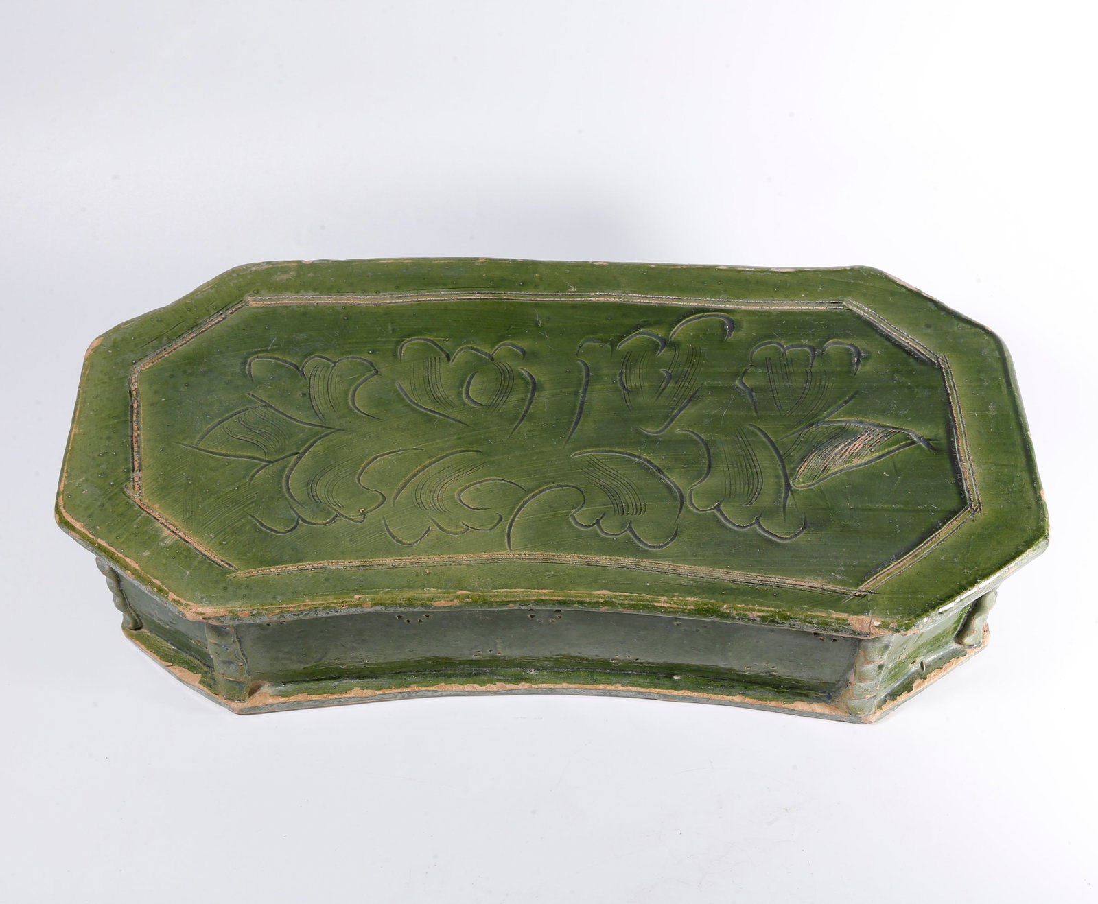 A GREEN?GLAZED FLOWER?PATTERN PILLOW: Green?glazed flower?pattern pillow