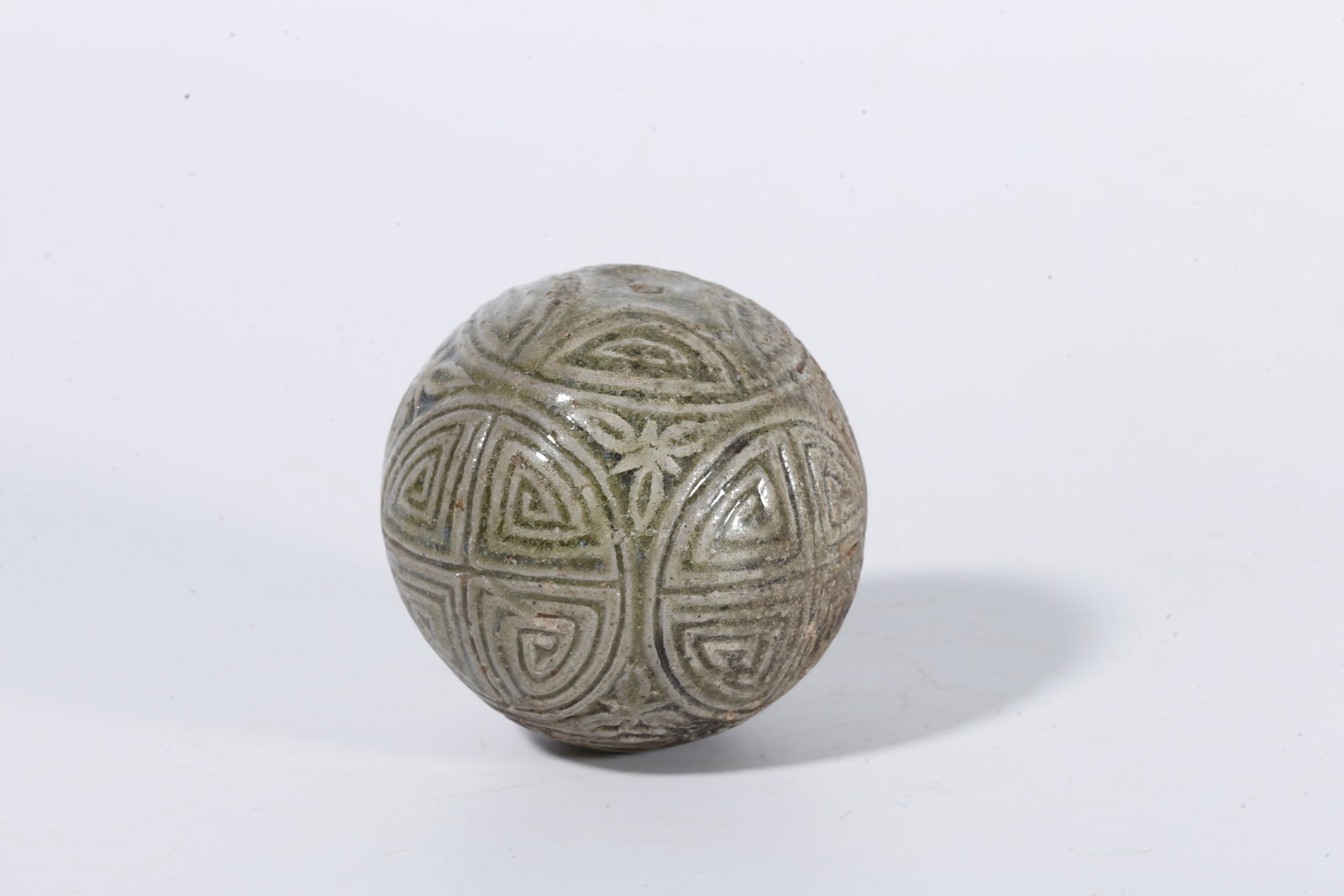 A CELADON SPHERE WITH SWASTIKA PATTERN - 2