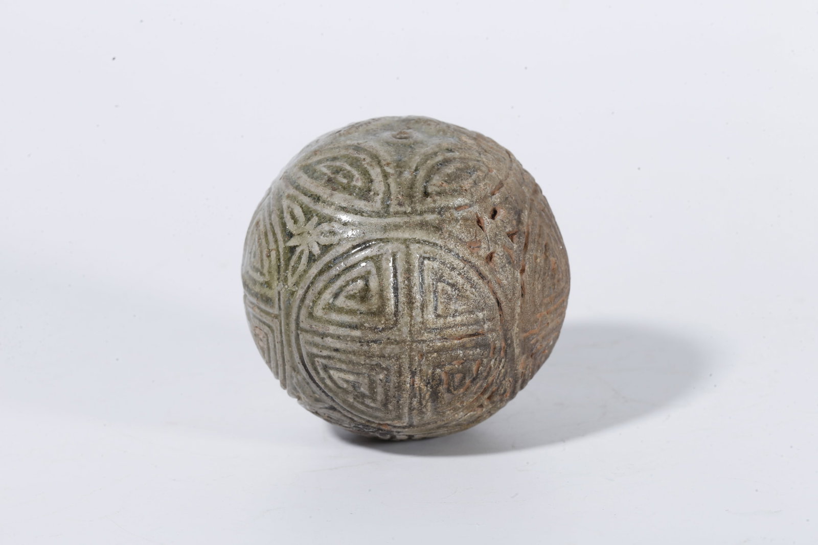 A CELADON SPHERE WITH SWASTIKA PATTERN - 3