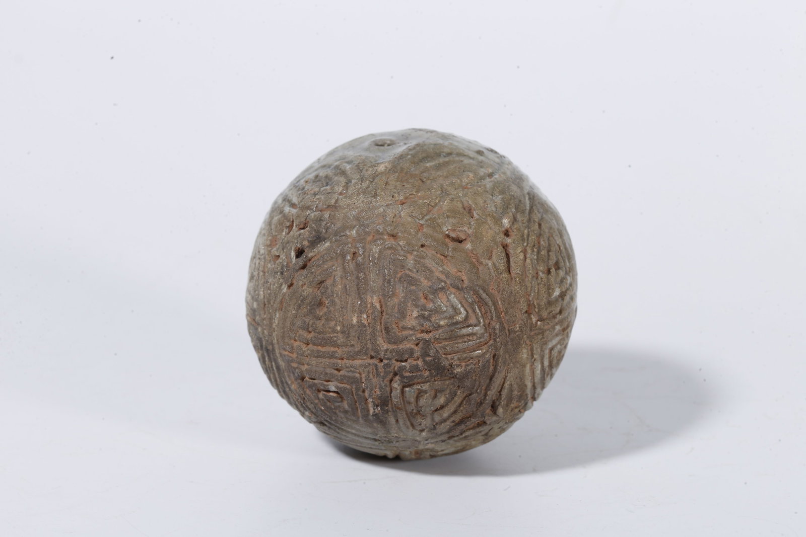 A CELADON SPHERE WITH SWASTIKA PATTERN - 4