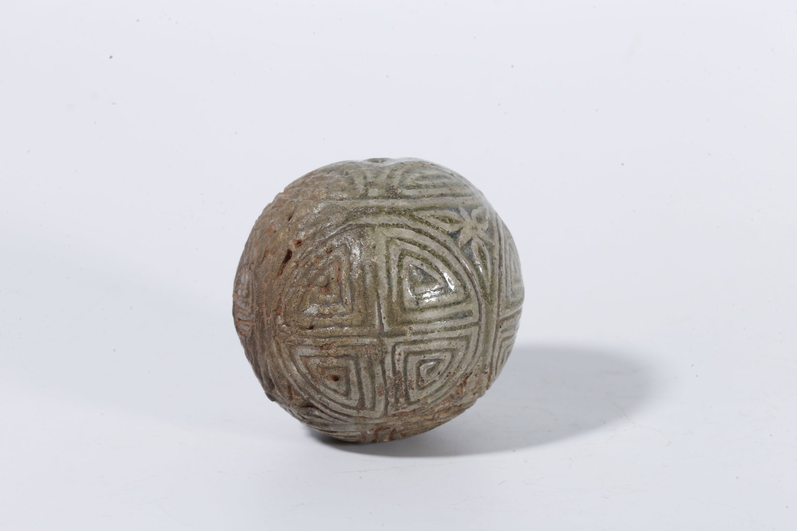 A CELADON SPHERE WITH SWASTIKA PATTERN - 5