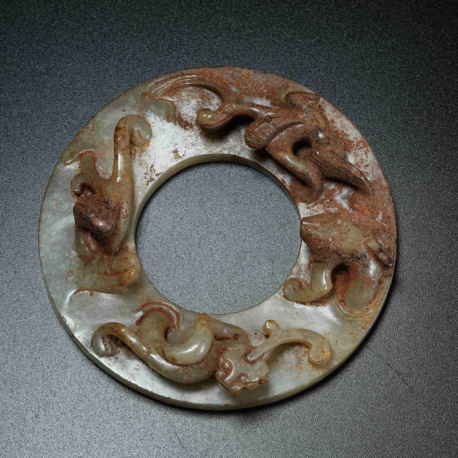 A ANCIENT JADE BI DISC WITH DIVINE FIGURE AND CHI DRAGON: Ancient Jade Bi Disc with Divine Figure and Chi Dragon
