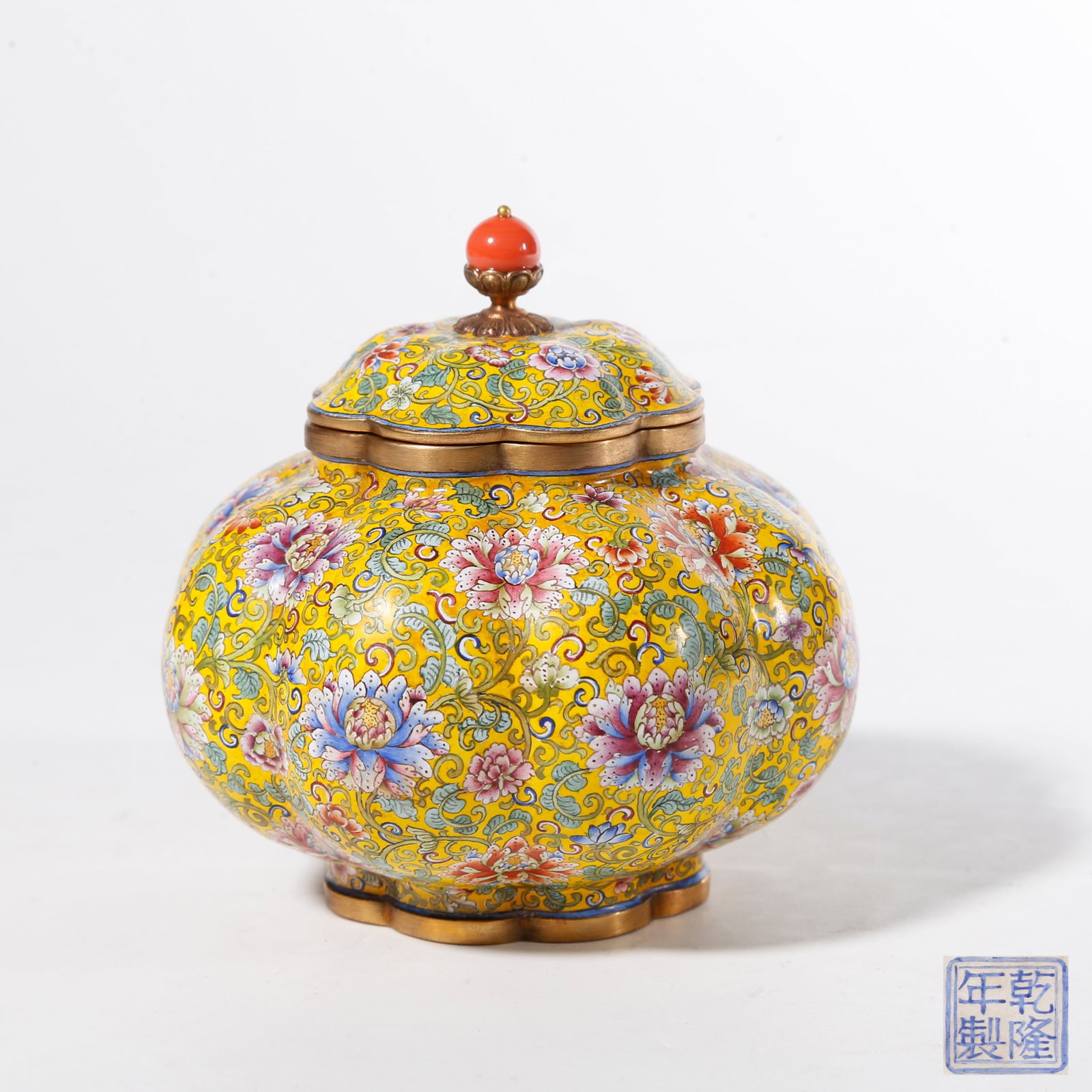 A PAINTED ENAMEL ON BRONZE BODY COVERED JAR WITH INTERLOCKING FLORAL SCROLLS (1 of 10)