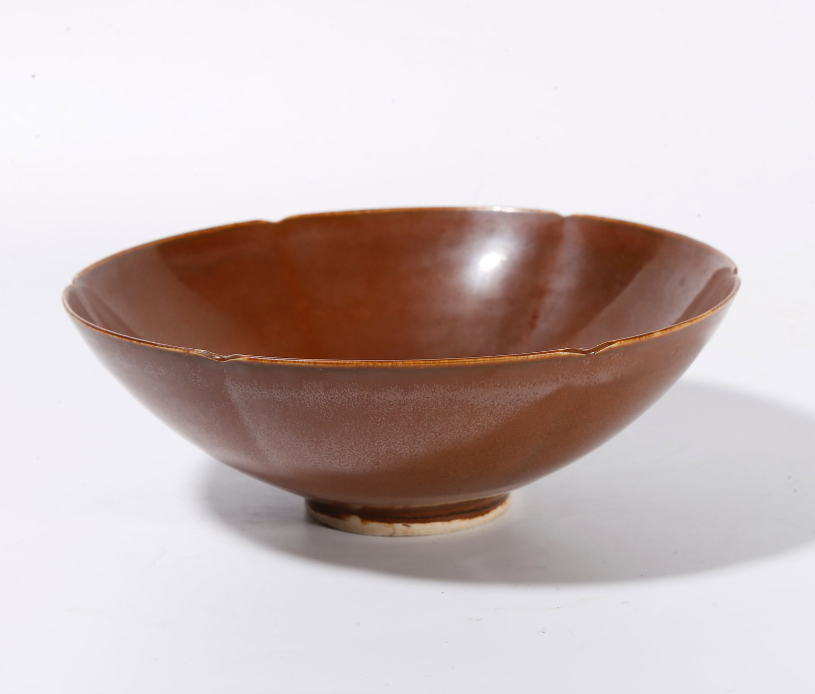A PURPLE DING PERSIMMON?GLAZED MALLOW?MOUTHED BOWL: Purple Ding persimmon?glazed mallow?mouthed bowl