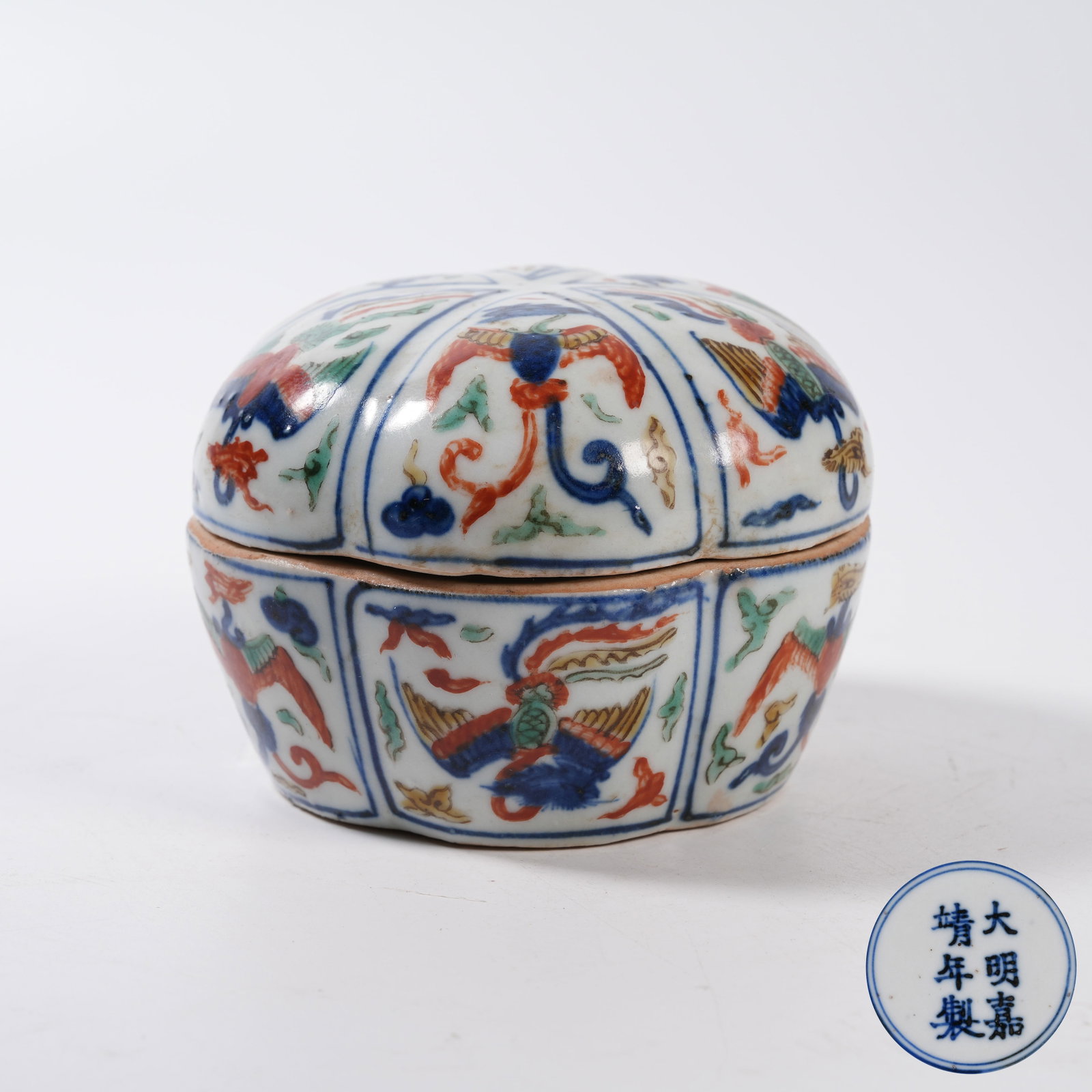 A MELON-SHAPED BLUE AND WHITE WUCAI COVERED BOX WITH PHOENIX PATTERN (1 of 8)