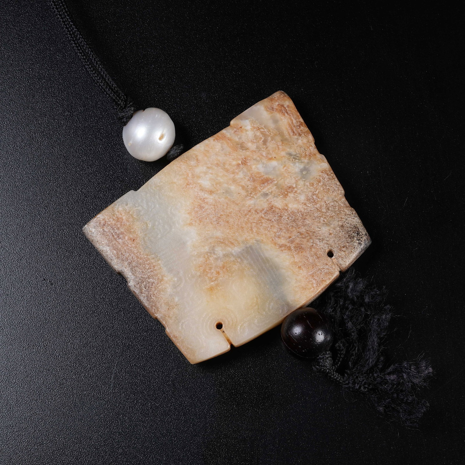 A ARCHAIC JADE PENDANT WITH BEAST MASK PATTERN: Archaic Jade Pendant with Beast Mask Pattern