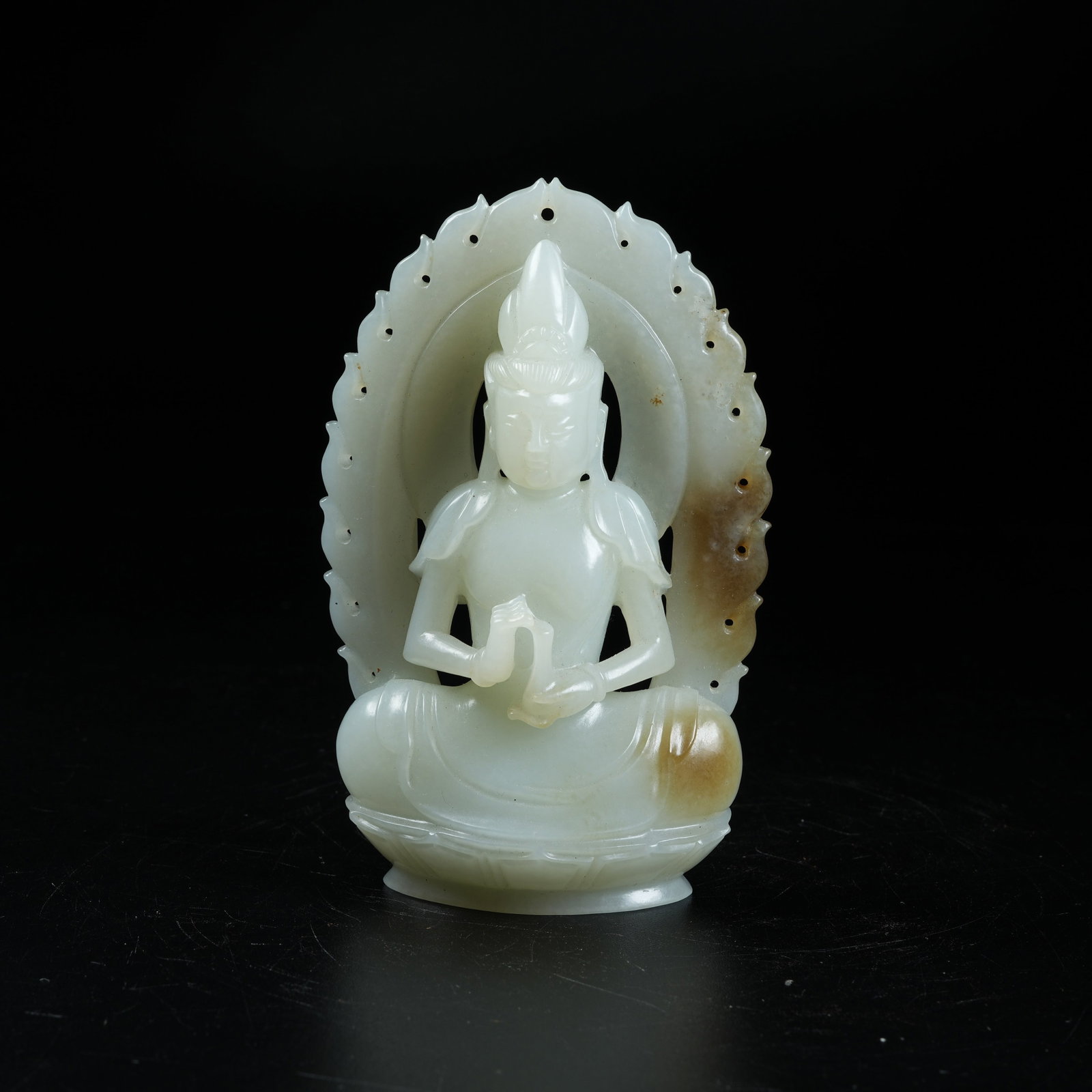 A HETIAN JADE SEATED GUANYIN STATUE (1 of 8)