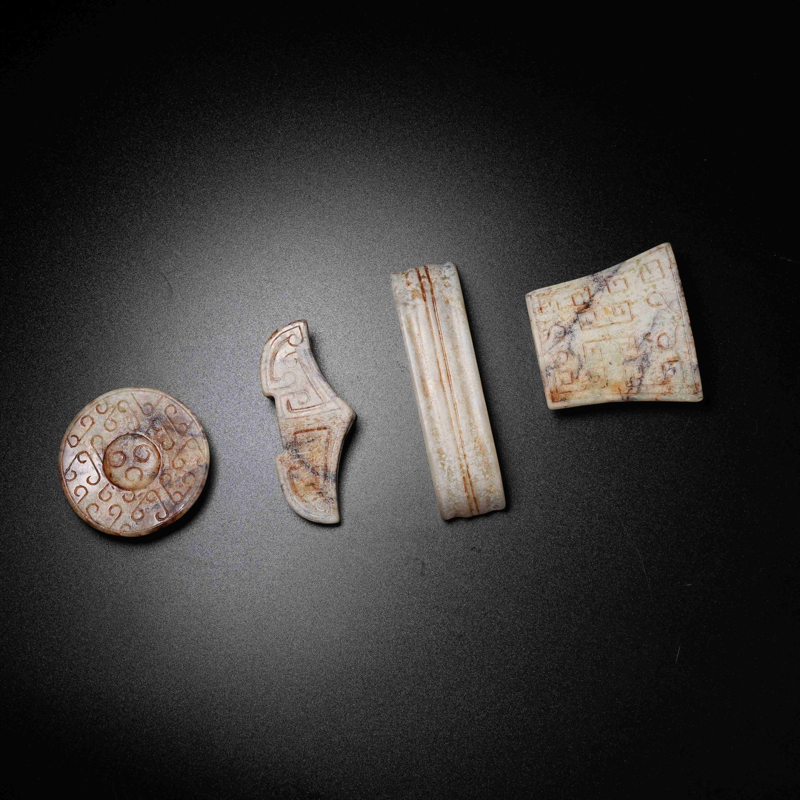 A SET OF ARCHAIC JADE SWORD FITTINGS: Set of Archaic Jade Sword Fittings