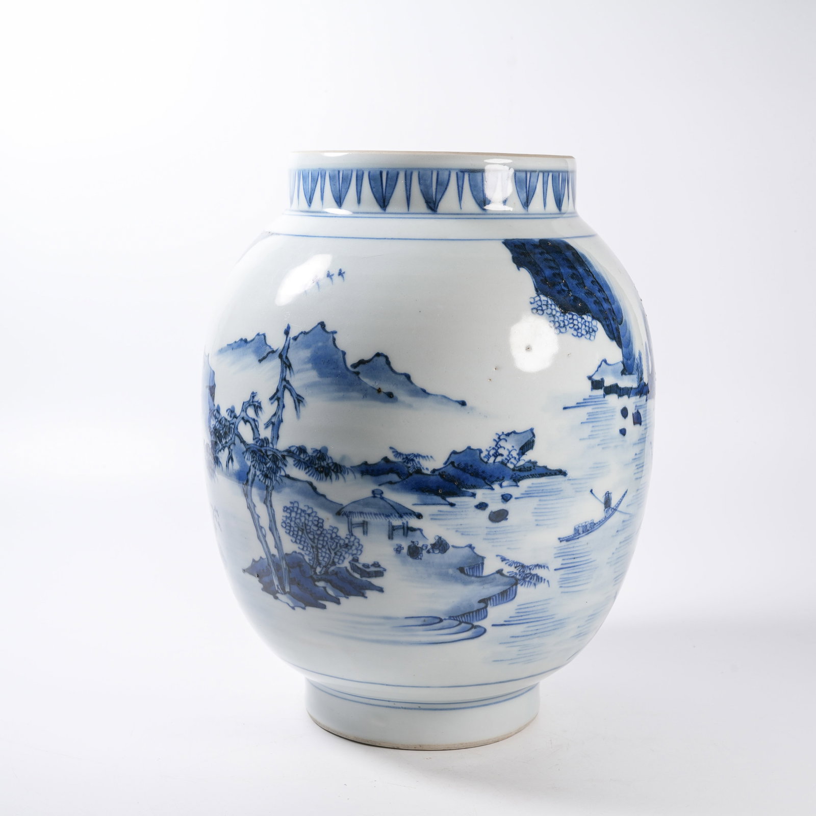 A BLUE AND WHITE LOTUS SEED JAR WITH LANDSCAPE AND PAVILION PATTERN: Blue and White Lotus Seed Jar with Landscape and Pavilion Pattern