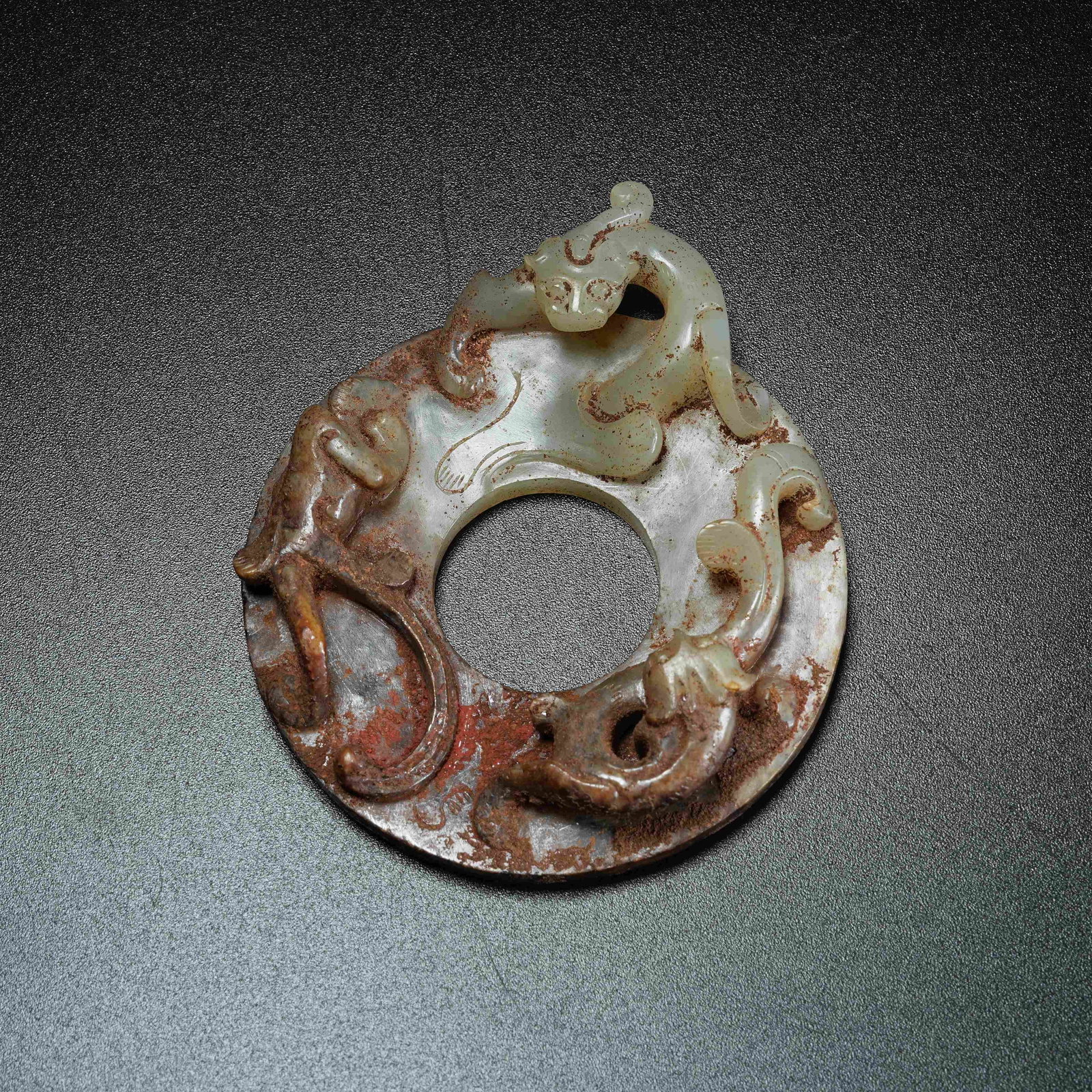 A ANCIENT JADE BI DISC WITH CHI DRAGON PATTERN: Ancient Jade Bi Disc with Chi Dragon Pattern
