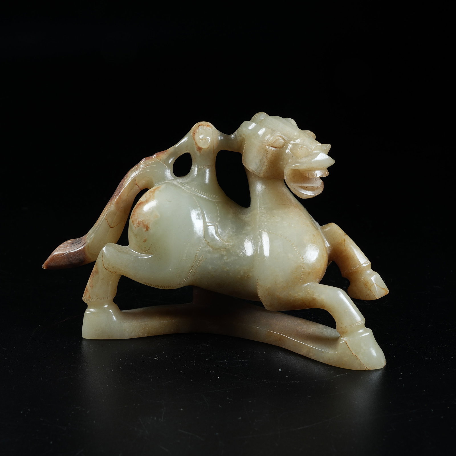A ANCIENT JADE ORNAMENT OF HUMAN RIDING HORSE: Ancient Jade Ornament of Human Riding Horse
