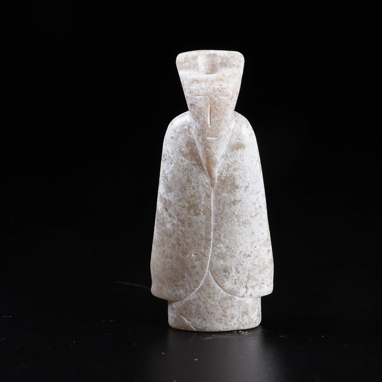 A ARCHAIC JADE WENGZHONG FIGURINE: Archaic Jade Wengzhong Figurine
