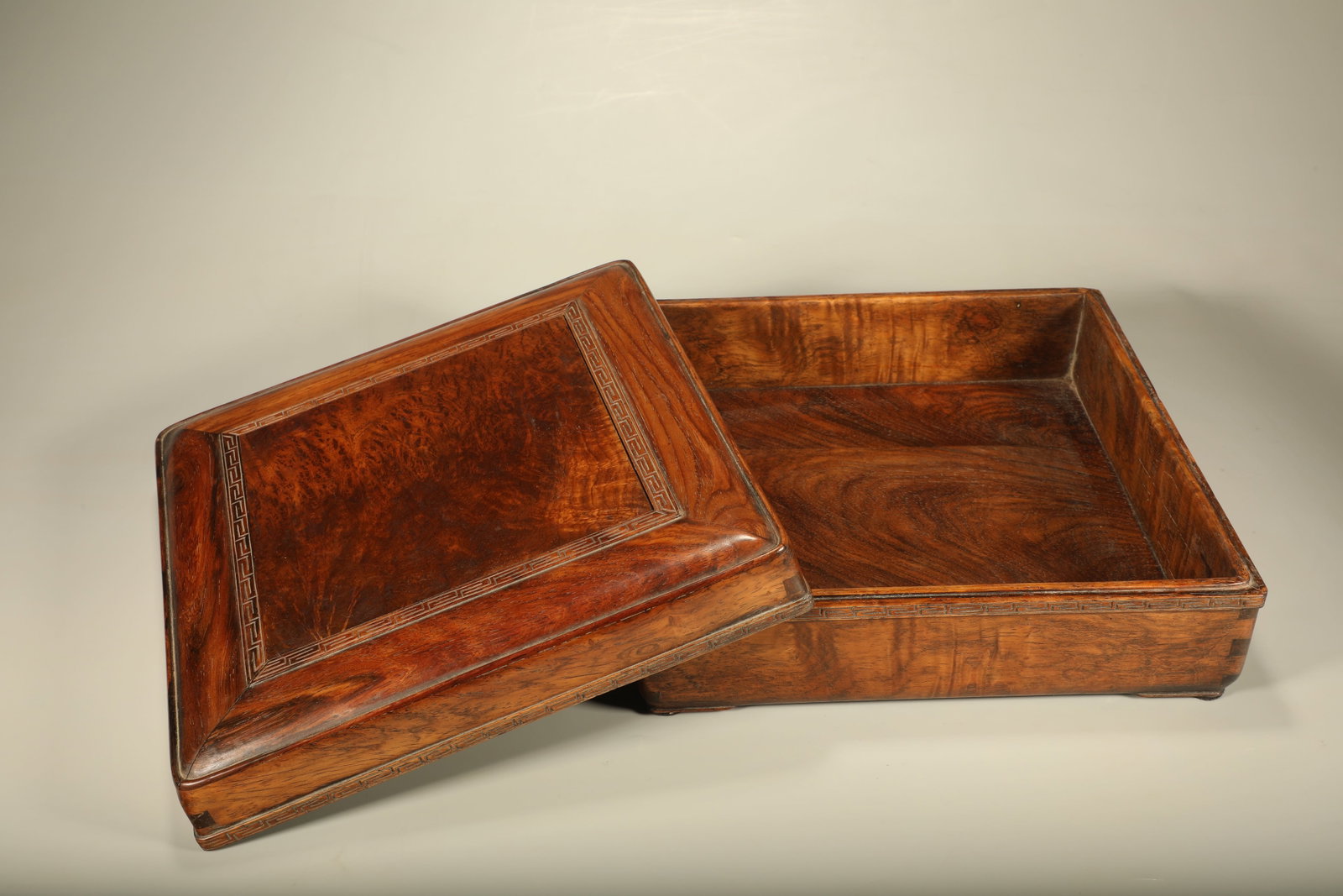 A HUANGHUALI HAND?HELD BOX CARVED WITH KEY?FRET PATTERNS (1 of 7)