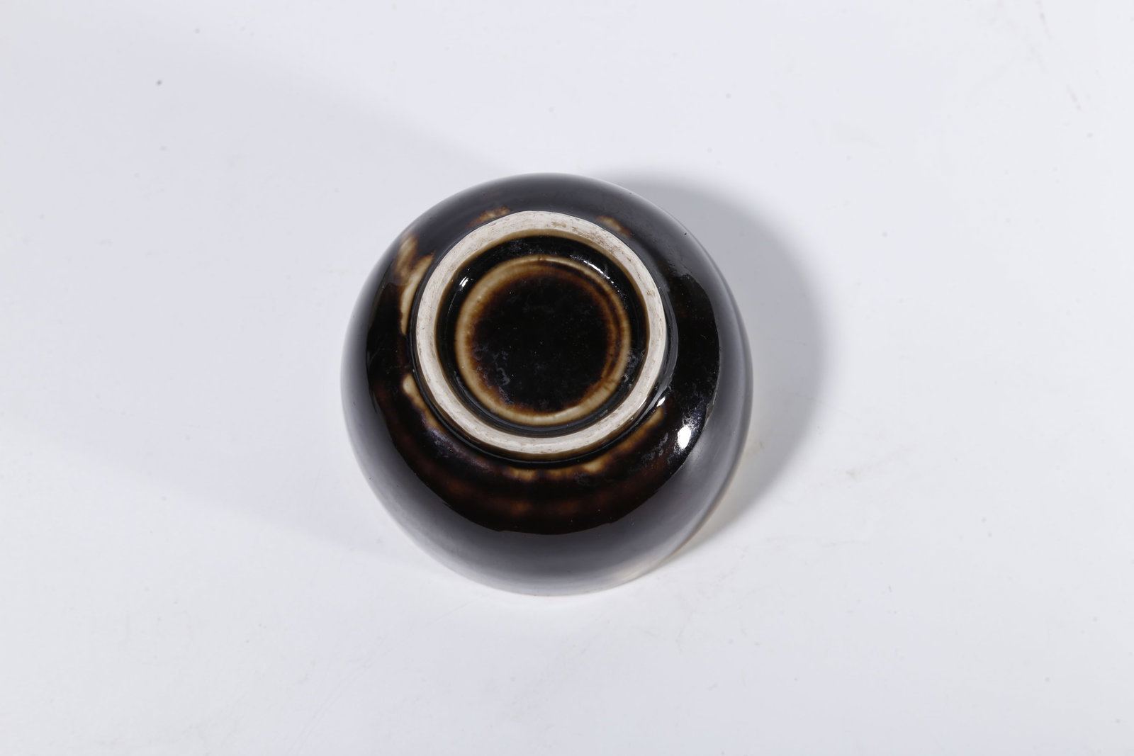 A BLACK DING COVERED JAR - 9
