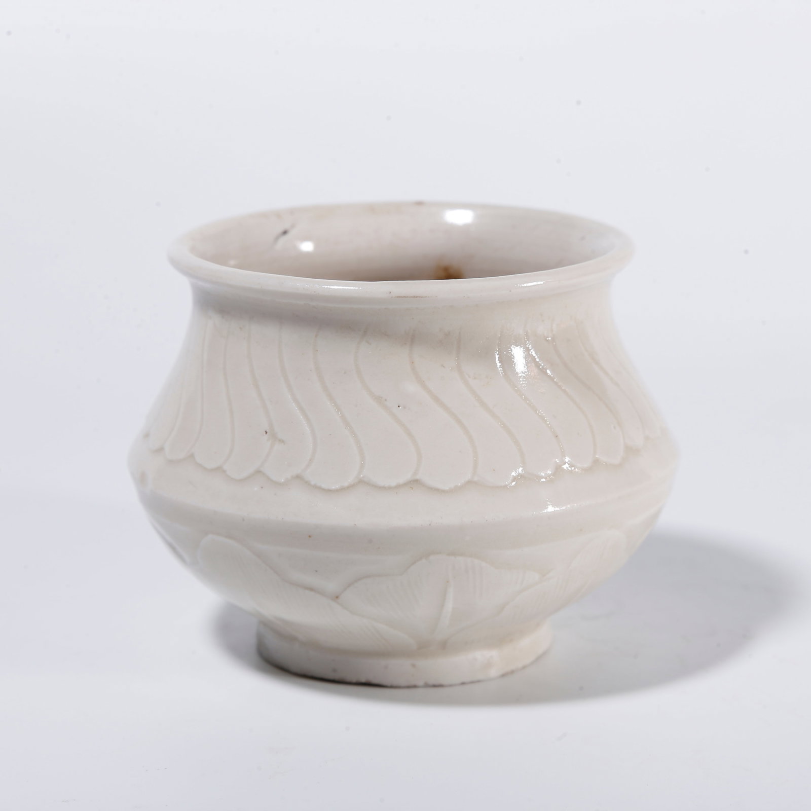 A DING WARE JAR WITH LOTUS PATTERN (1 of 9)