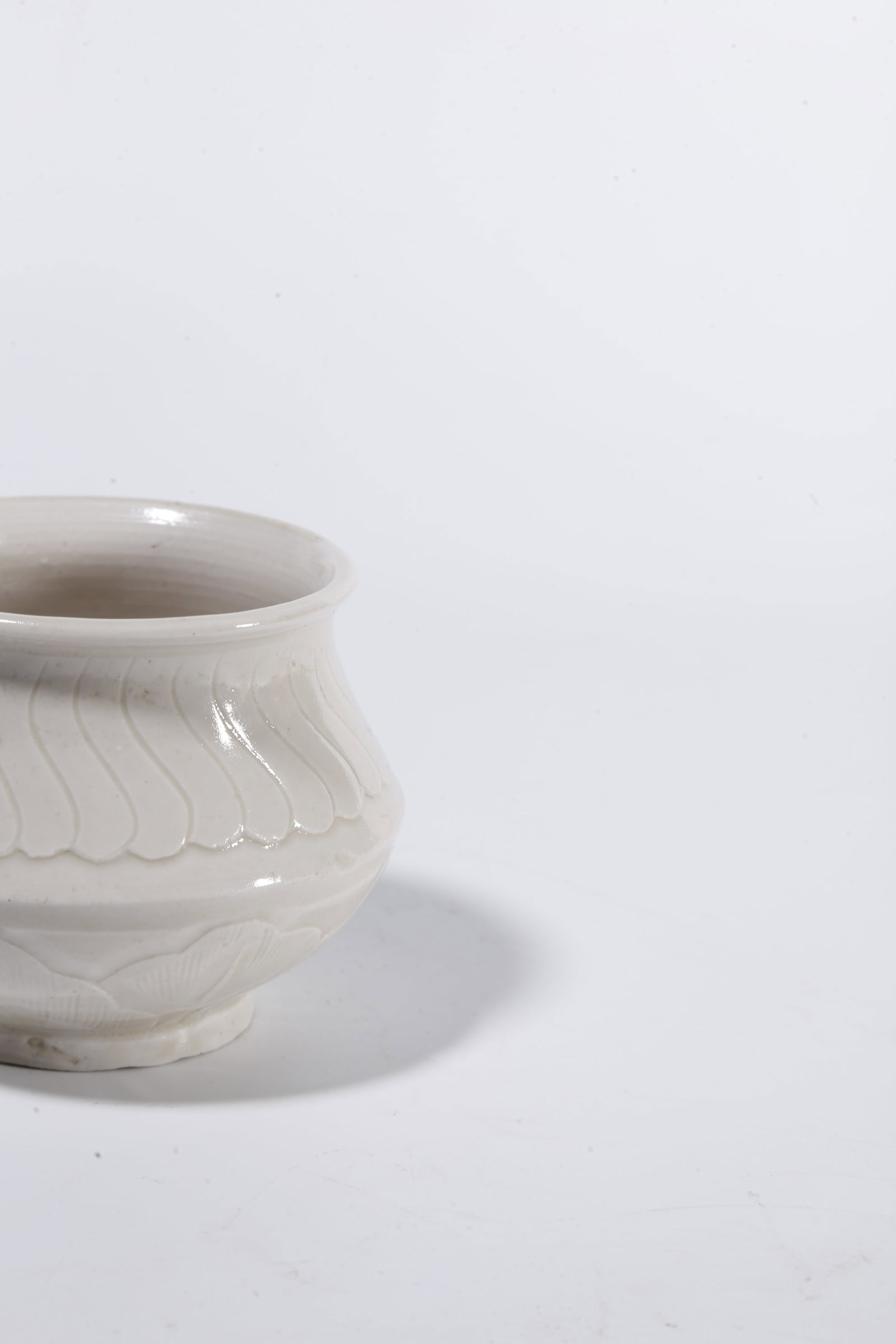 A DING WARE JAR WITH LOTUS PATTERN - 7