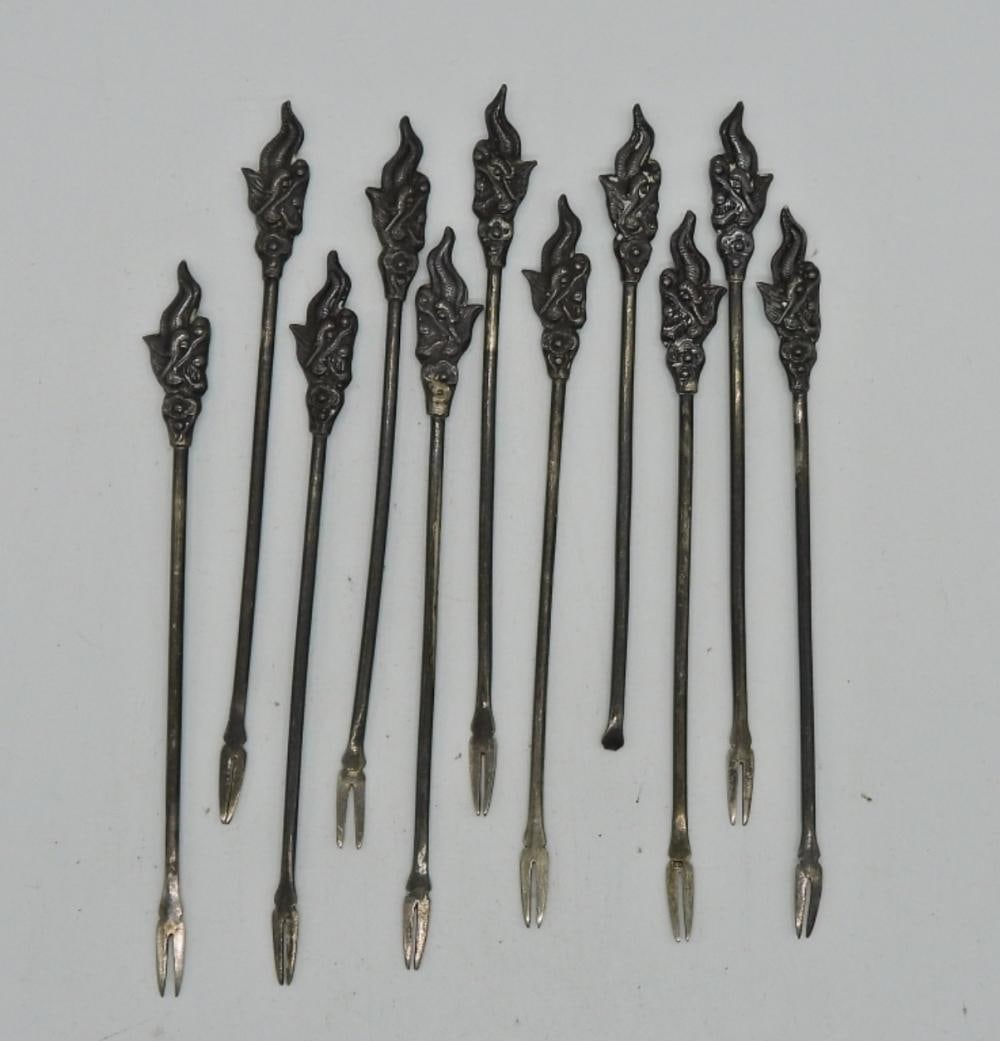 11 DRAGON HEAD COCKTAIL FORKS (1 of 3)