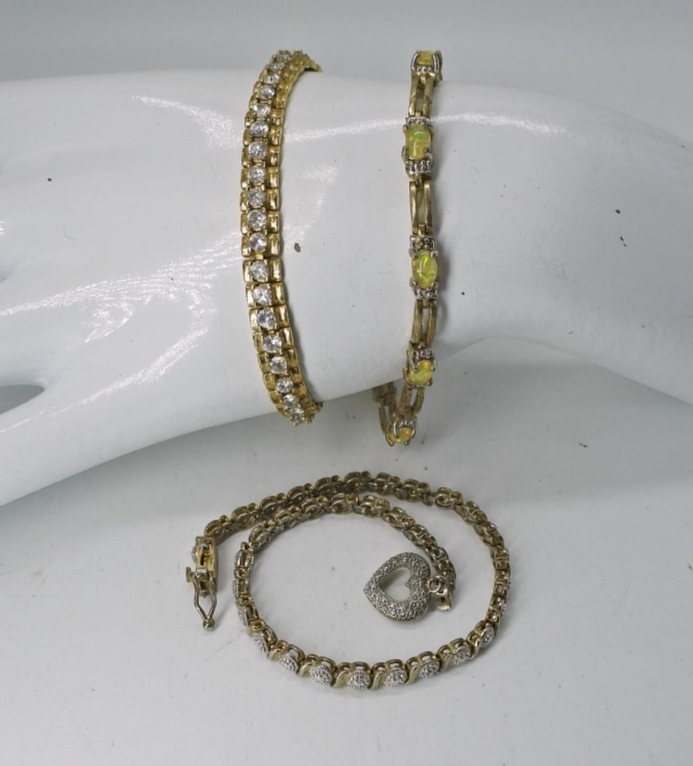 (3)GOLD TONE TENNIS BRACELETS: (3)GOLD TONE TENNIS BRACELETS