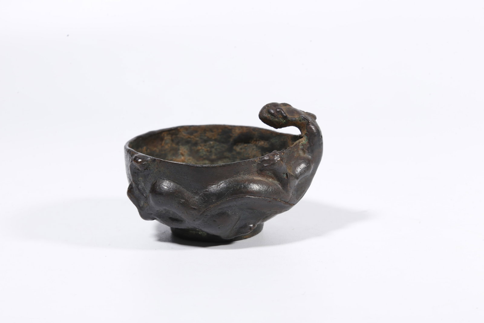 A BRONZE WATER BASIN IN ANIMAL FORM: Bronze Water Basin in Animal Form