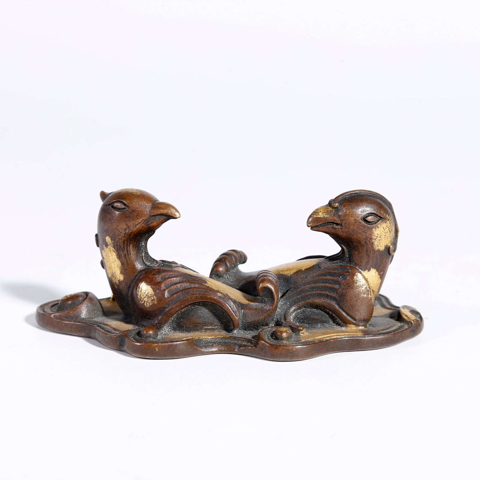 A GILT BRONZE BIRD-SHAPED ORNAMENT (1 of 9)