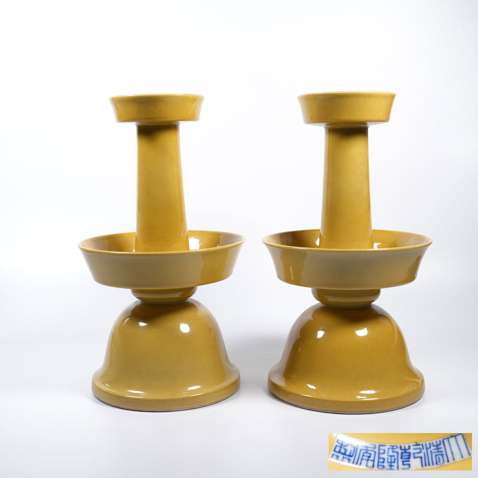 A PAIR OF LEMON?YELLOW GLAZED CANDLESTICKS: Pair of Lemon?Yellow Glazed Candlesticks
