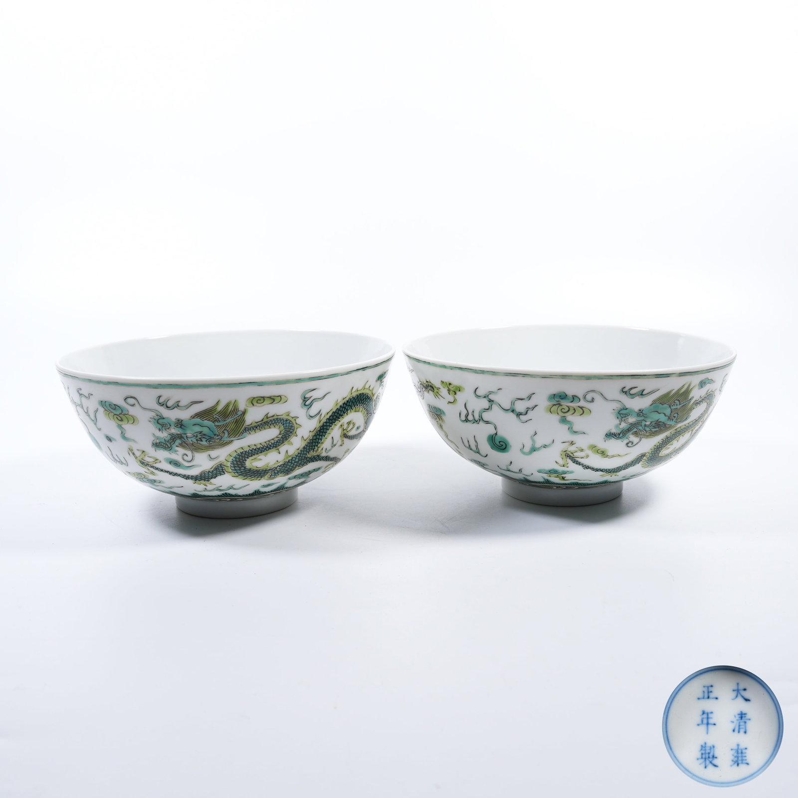 A PAIR OF GREEN?ENAMEL BOWLS WITH DRAGON?CLOUD MOTIFS: Pair of Green?Enamel Bowls with Dragon?Cloud Motifs