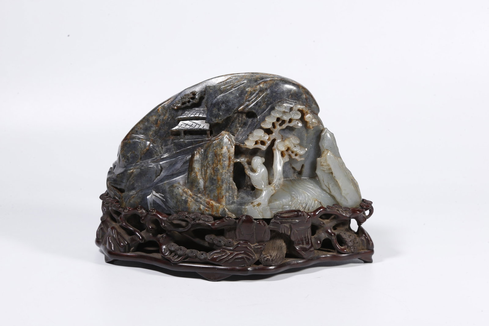 A HETIAN JADE MOUNTAIN-SHAPED CARVING WITH SKILLFULLY CARVED FIGURES (1 of 9)