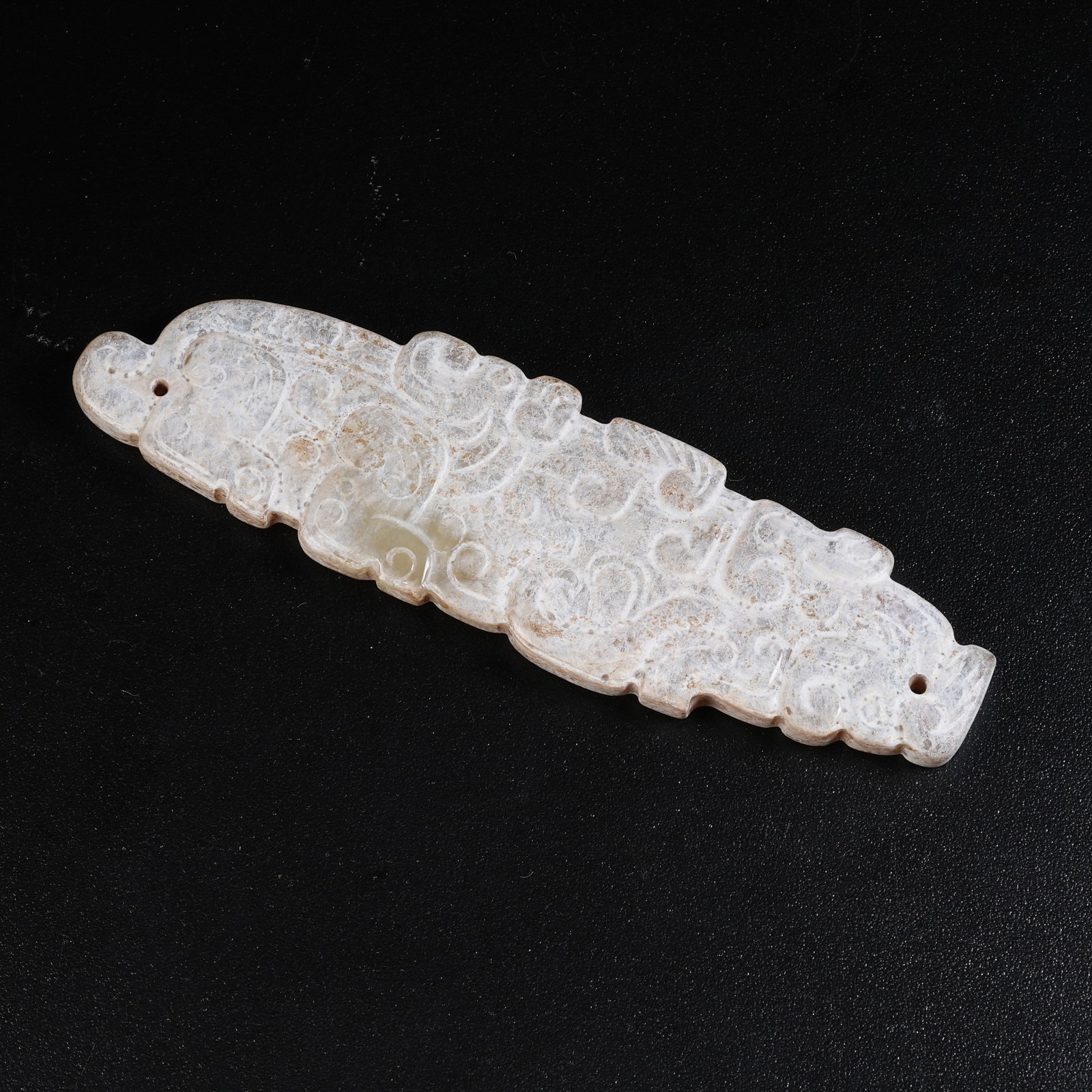 A ANCIENT JADE PENDANT WITH HOOKED CLOUD PATTERNS (1 of 8)