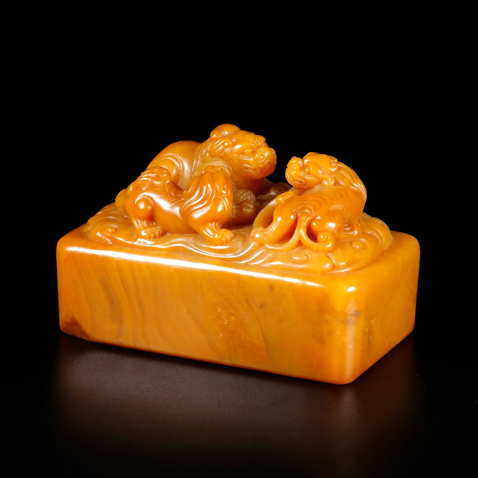 A SHOUSHAN FIELD?YELLOW STONE SEAL CARVED WITH MYTHICAL?BEAST KNOB: Shoushan field?yellow stone seal carved with mythical?beast knob