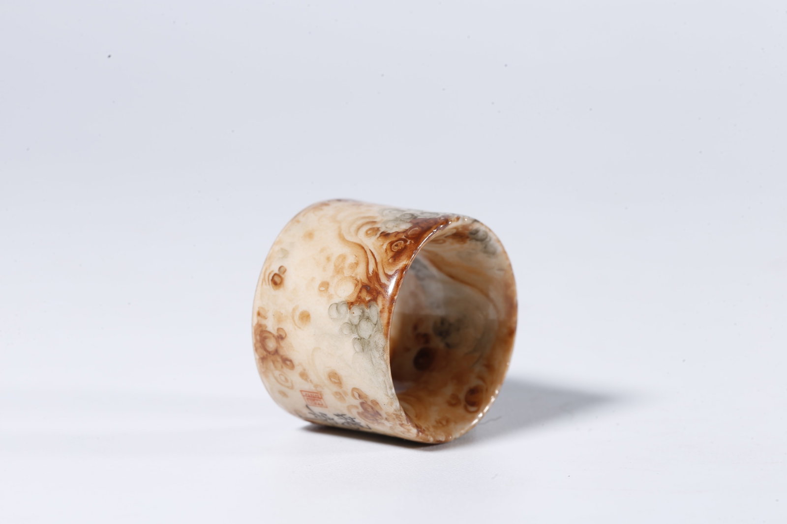 A STONE-PATTERN GLAZED THUMB RING - 6
